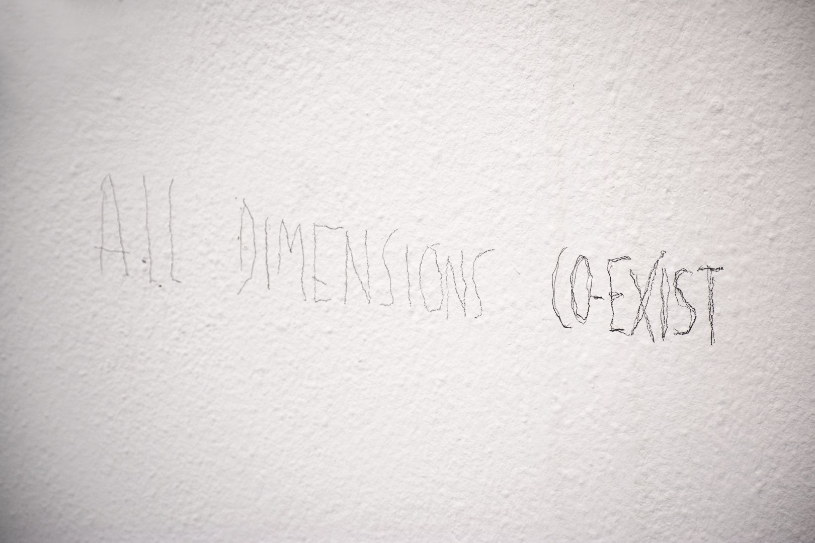 Section of the text written all along the walls