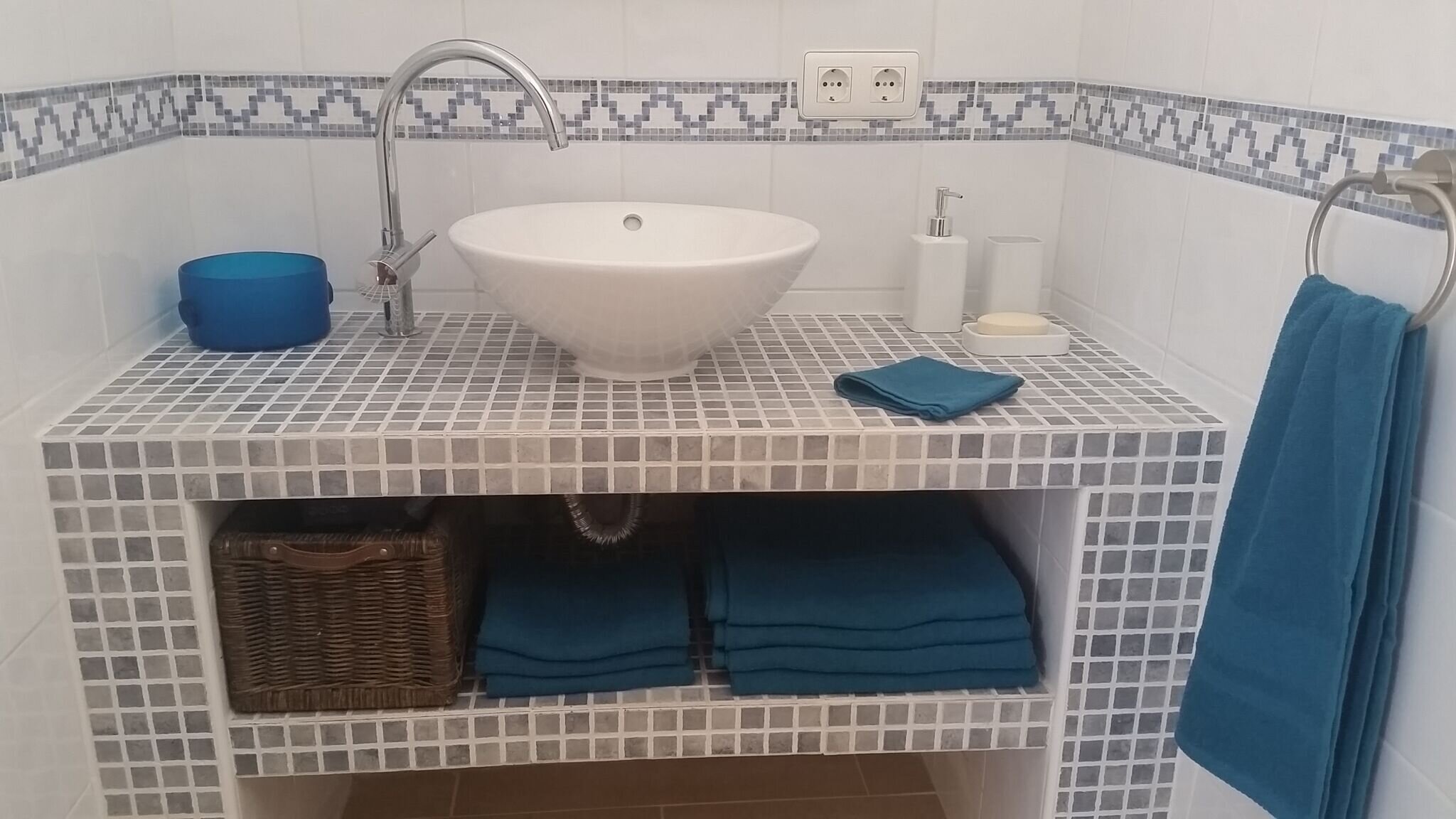Family shower room with water saving taps and nebia shower