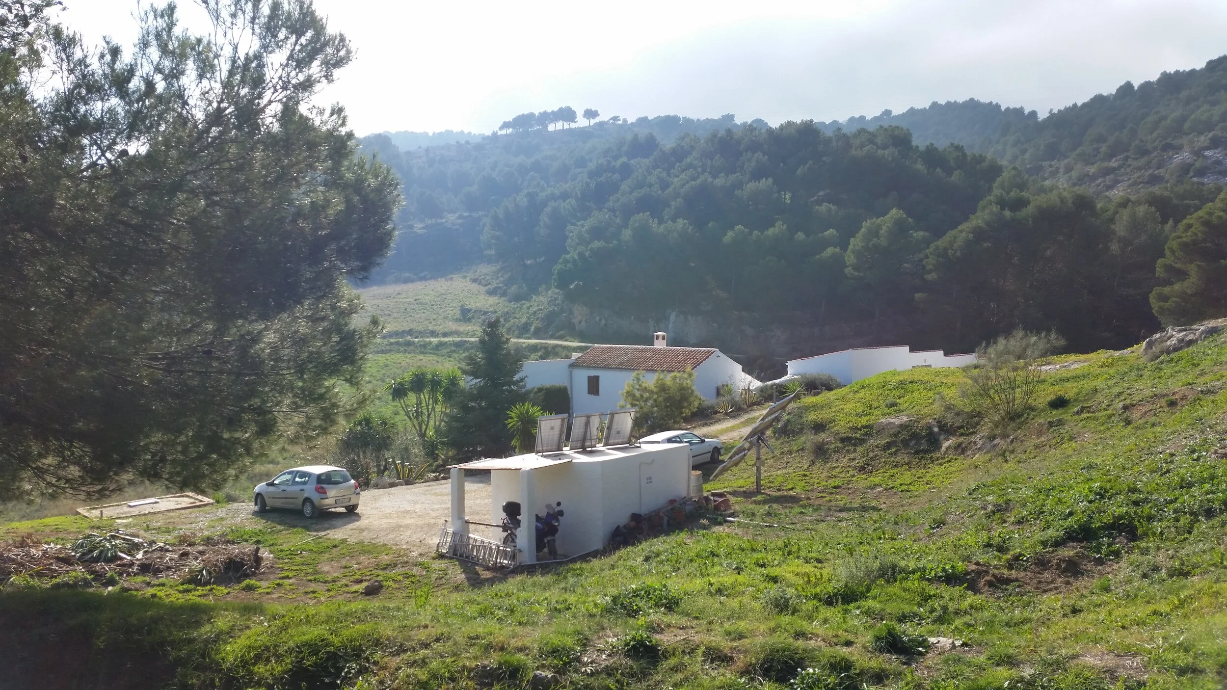 The house in the landscape in July 2016