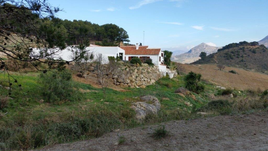The house with the Sierra de las Nieves National Park behind