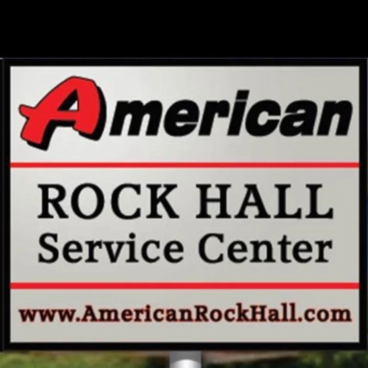 Sign for American Rock Hall Service Center with URL www.AmericanRockHall.com