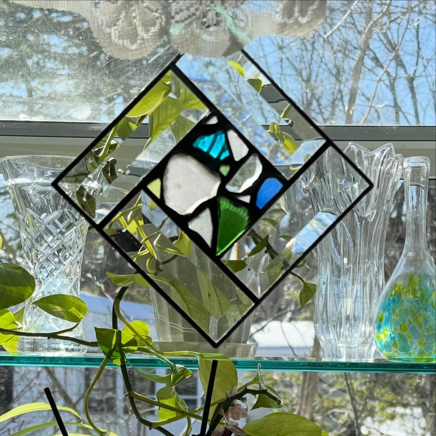 Enjoying a fresh window arrangement and winter light on ##guildayglass