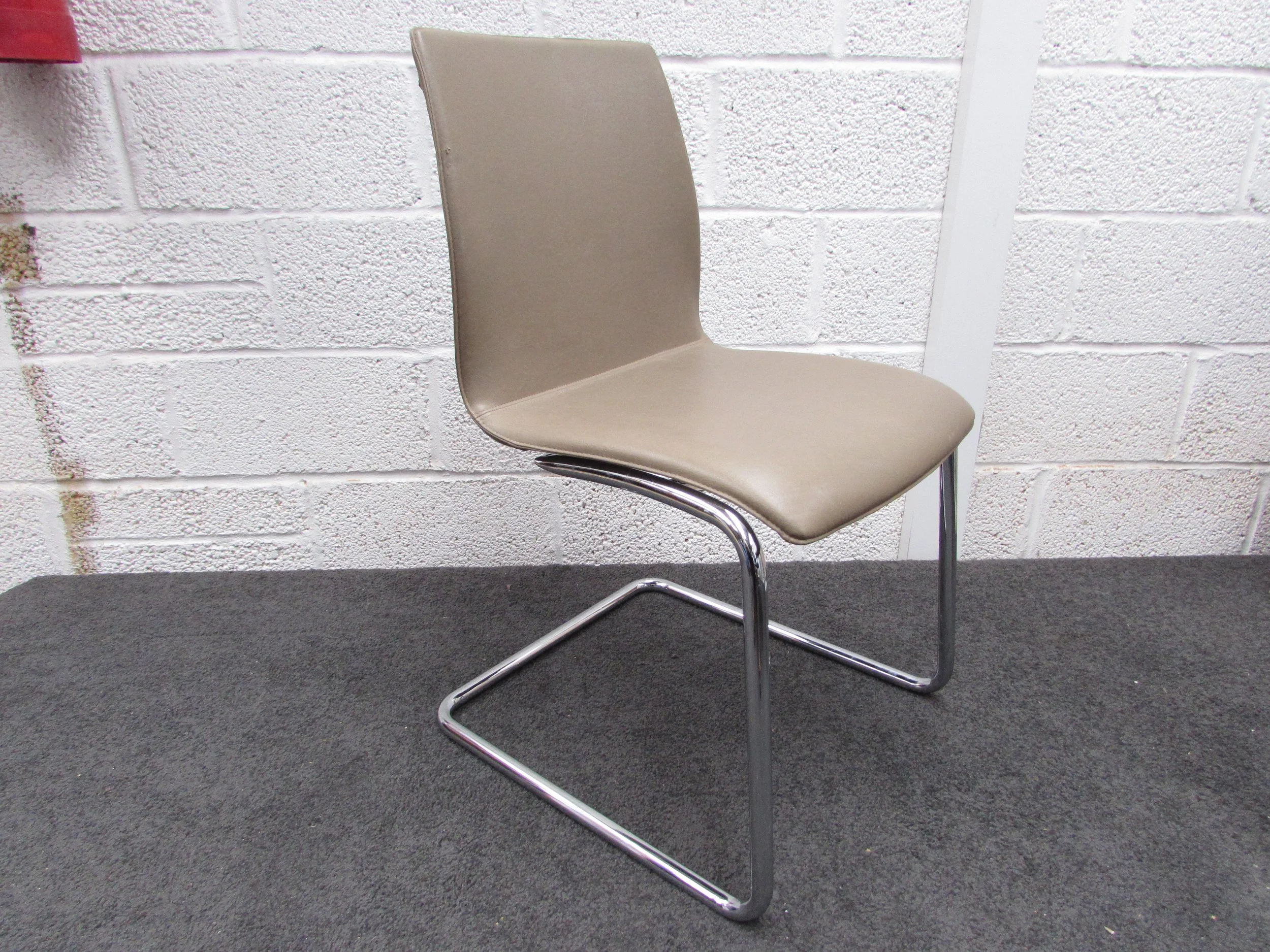 Kushch leather cantilevered office, dining, stacking chairs