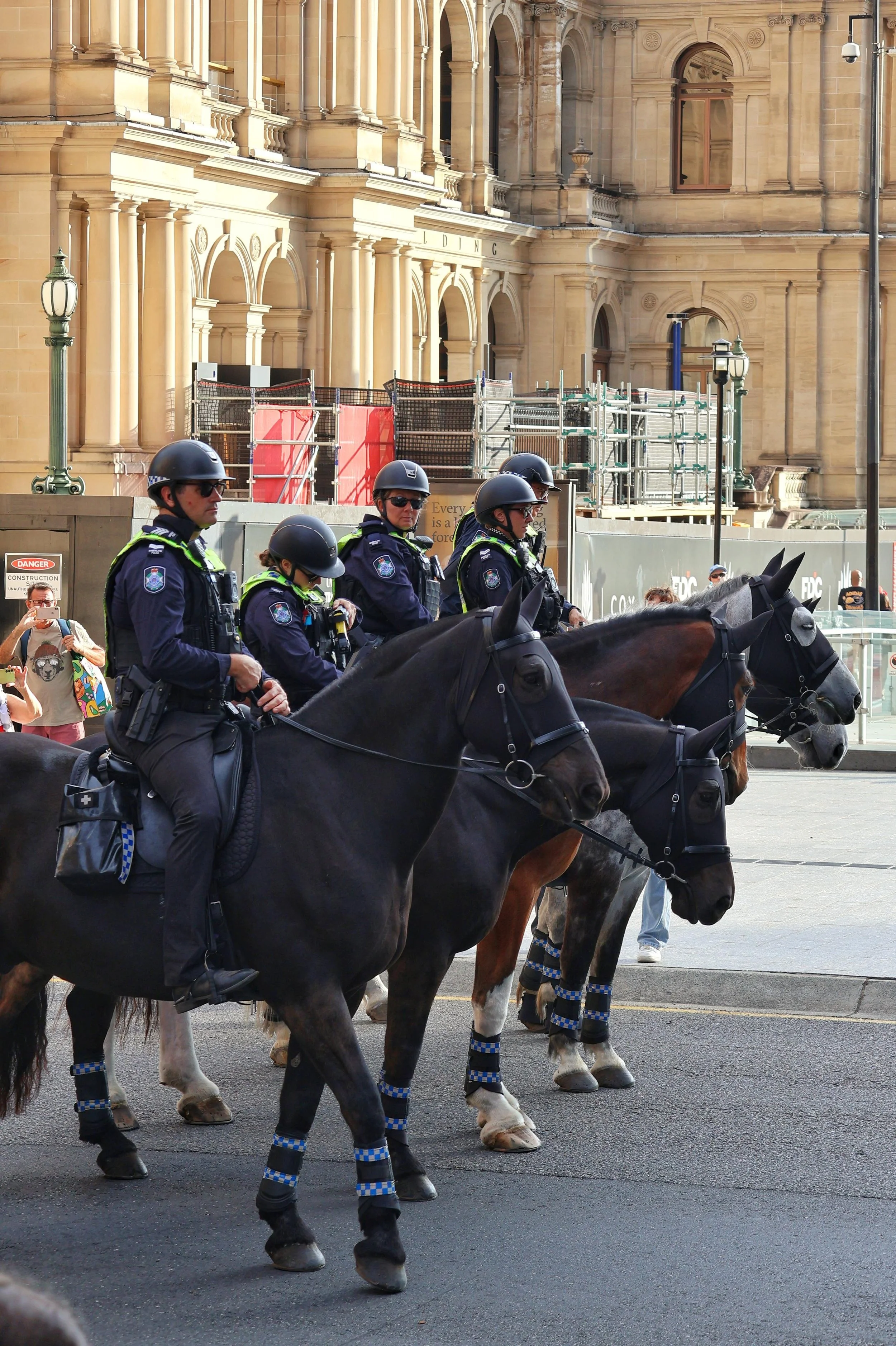 5 police officers on horeseback