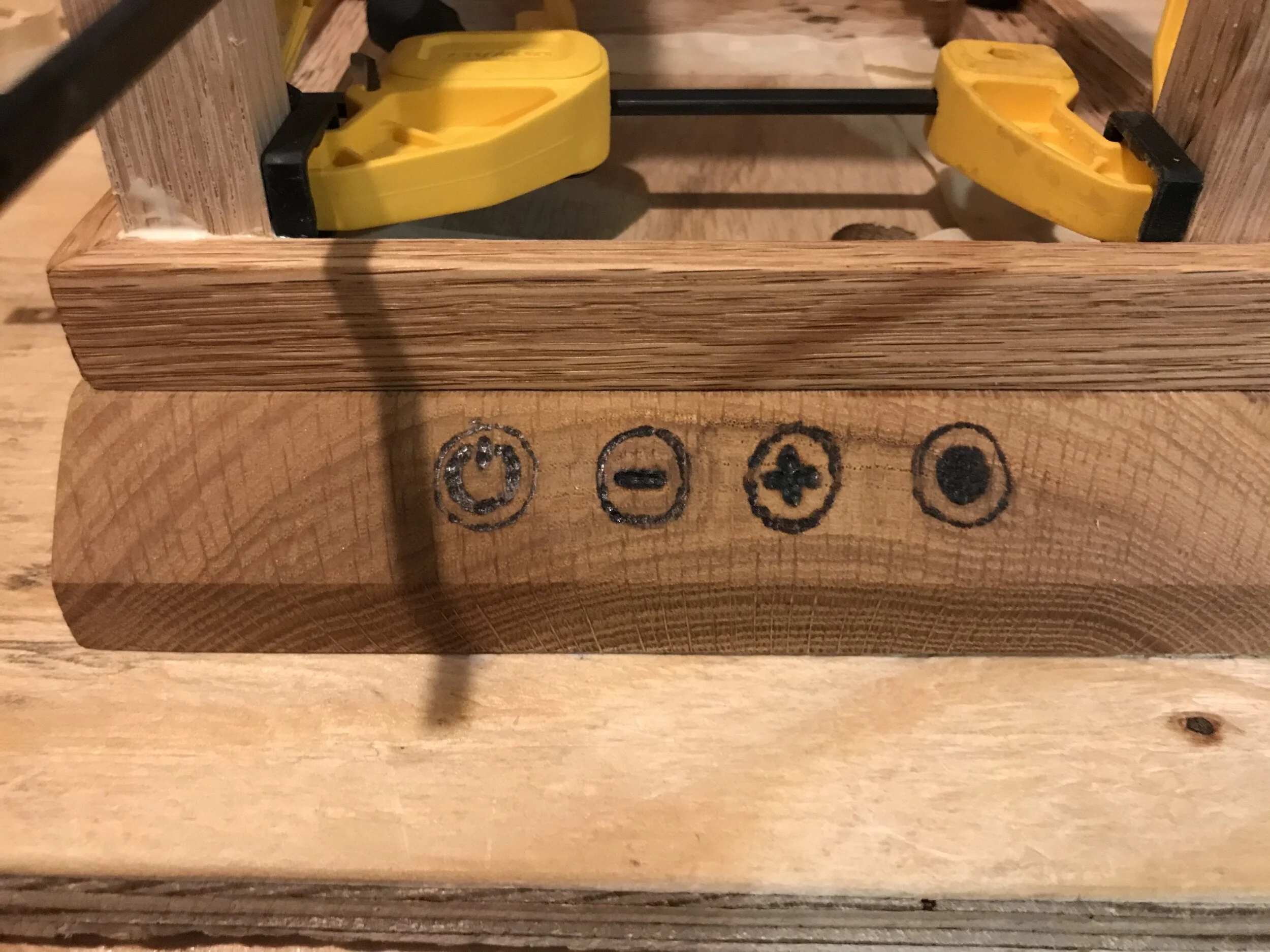Wood burned button panel