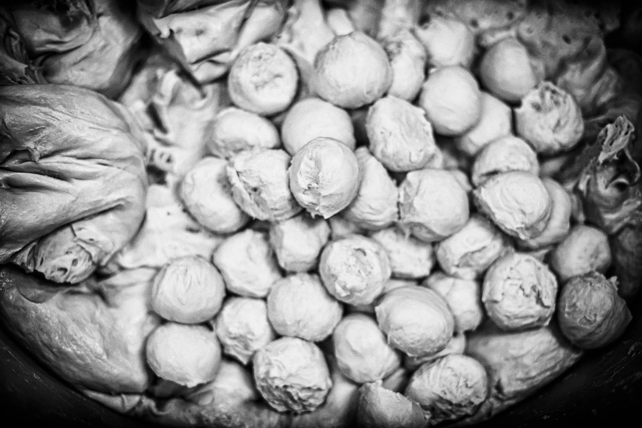 Hundreds of dough balls are prepared daily to meet the staggering demands.