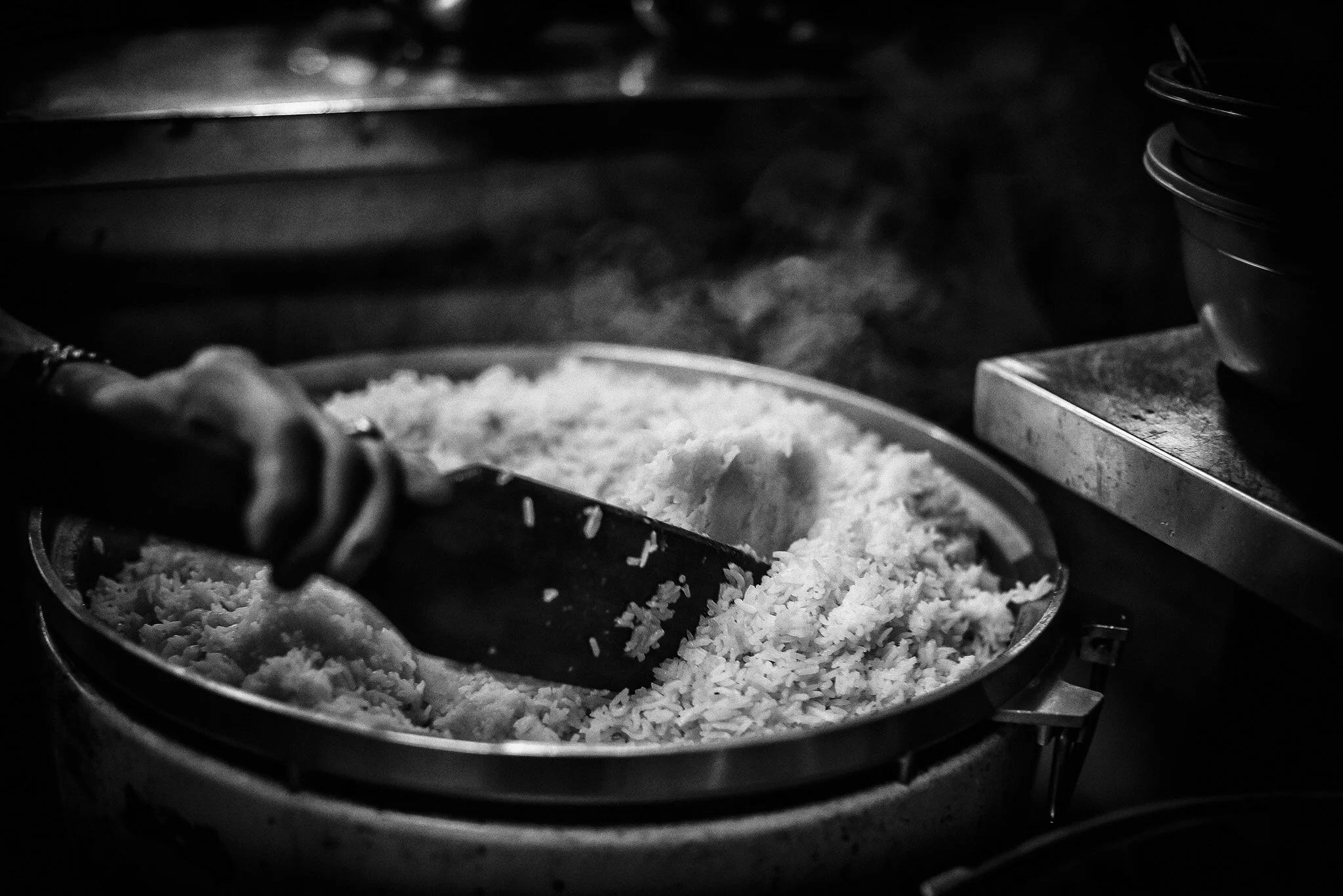Nasi lemak is made up of rice cooked in coconut cream and pandan leaves.