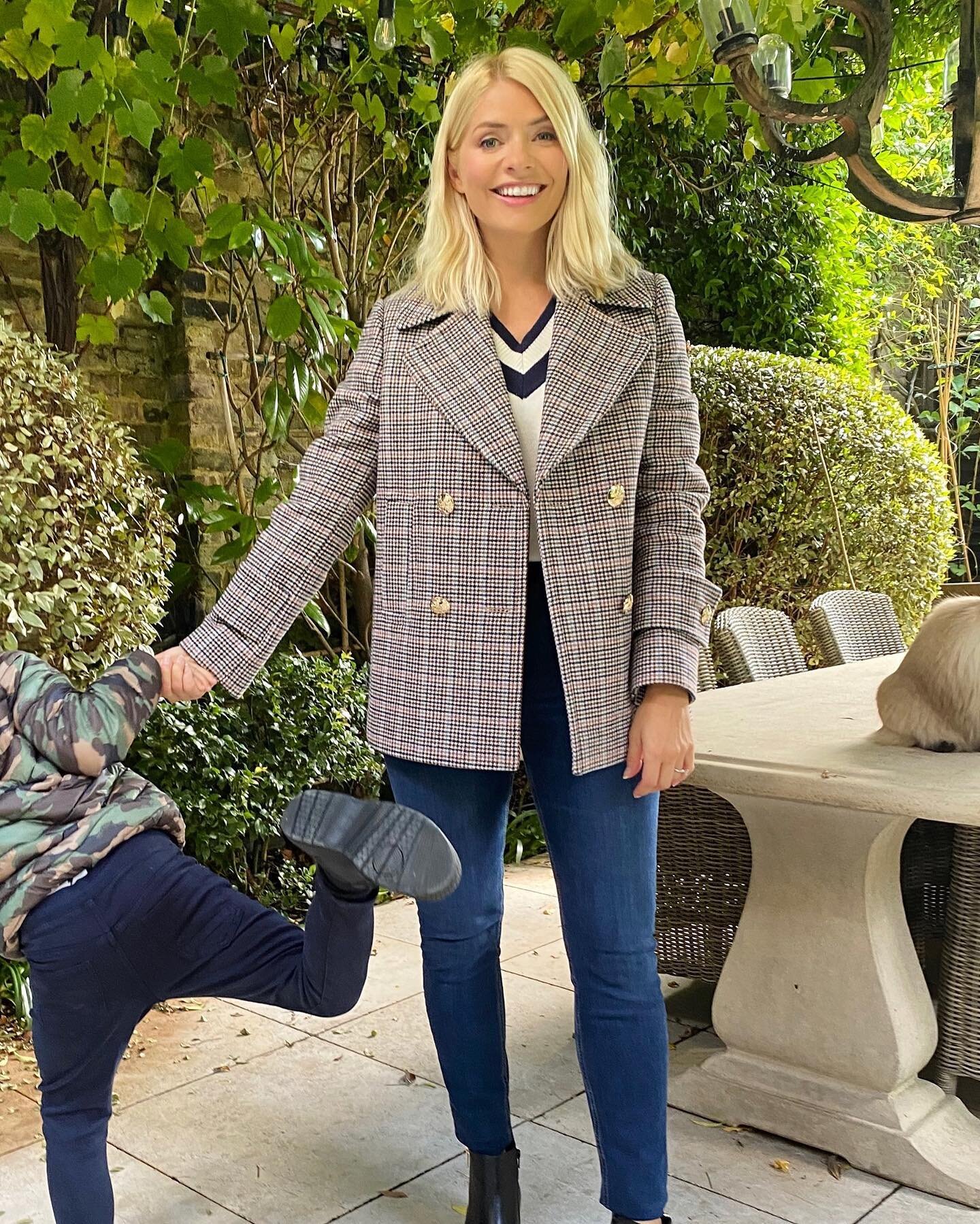 The checked pea coat with serious style legs &ndash; jeans, dresses, jumpsuits, it goes with it all. As seen on @hollywilloughby. 🍂