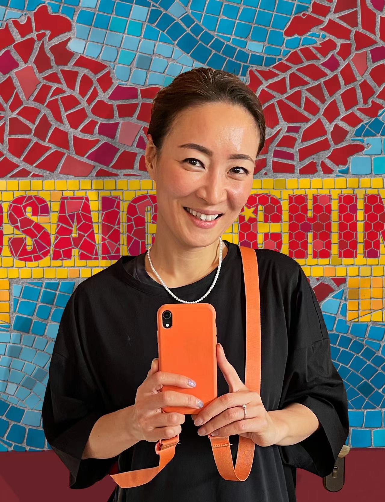 Kim YoungAh's object: Her bright orange phone carrier, which symbolises the efficiency and mobility she needs to be successful as a corporate employee as well as a mother of two kids.