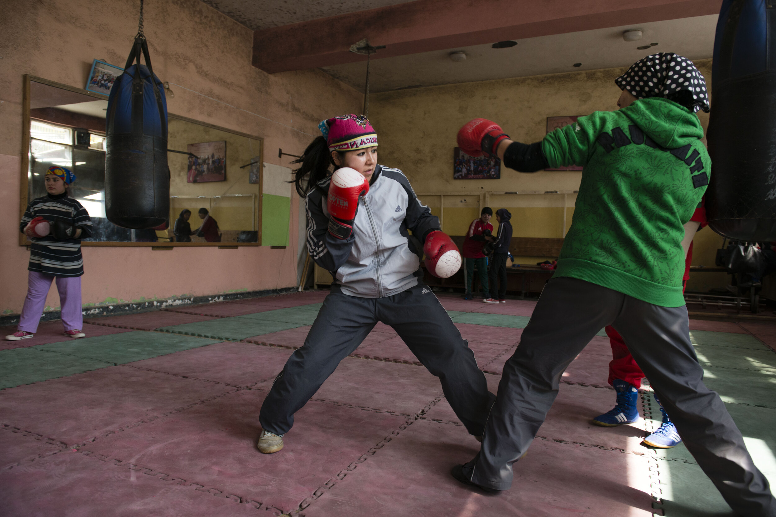  In 2015, members of the Afghanistan’s women’s boxing team practice in Kabul. © Kiana Hayeri  