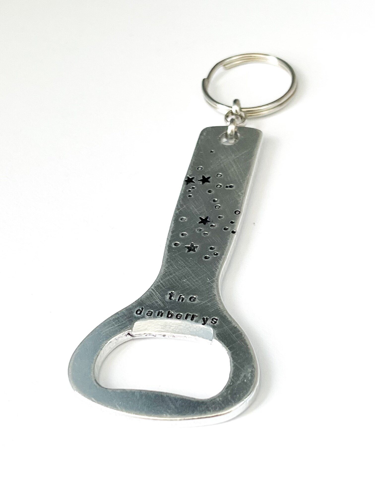 The Danberrys constellation bottle opener keychain in heavy gauge aluminum