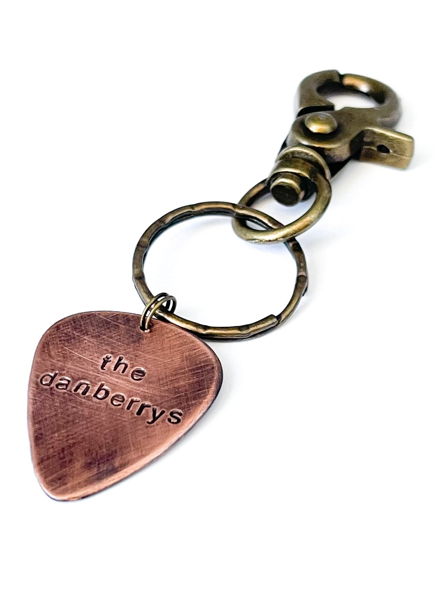 The Danberrys copper guitar pic keychain