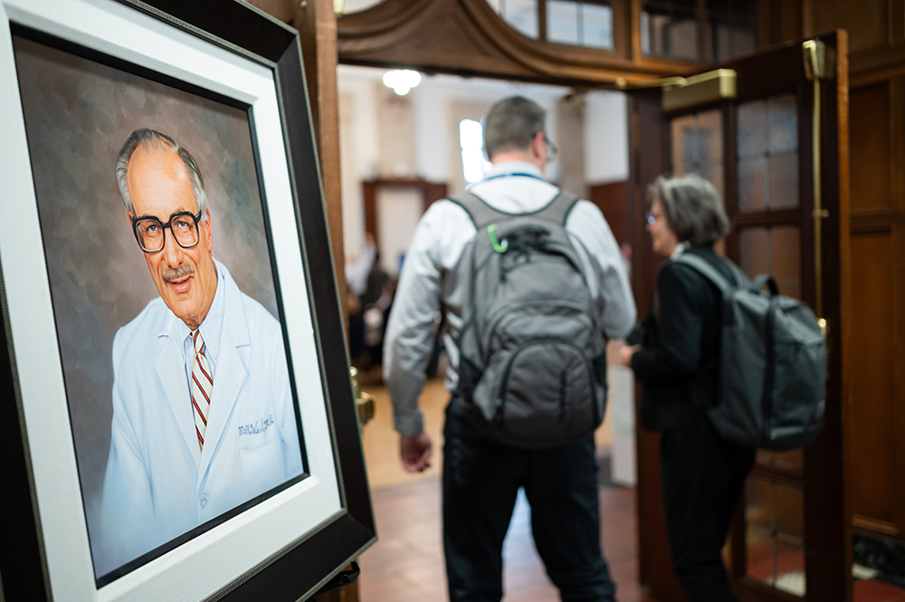  A portrait of Dr. Max Harry Weil outside the entrance to the Michigan Union Rogel Ballroom. Dr. Weil often chaired the Wolf Creek Conference. 