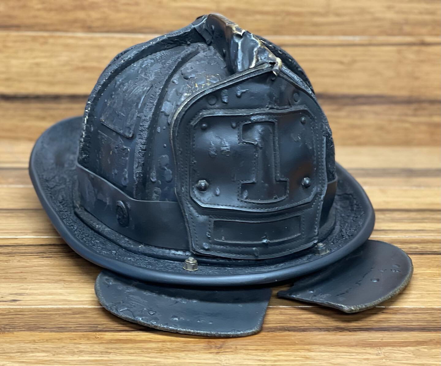 N5A with extensive brim damage came in to be made back into a helmet. First set of pics show the after and last few are when in was in pieces. This was a budget repair and it we were not suppose to steal the character of the helmet.

Repair list is s