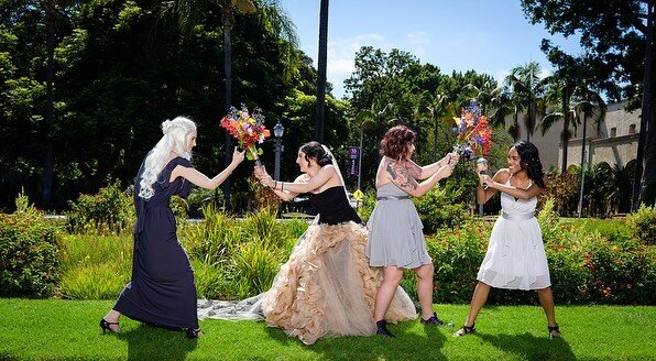 MAY THE 4TH BE WITH YOU!  When you use a lightsaber handle for your bouquets, it naturally leads to &quot;fights&quot; with the wedding party!  And this Star Wars loving couple even found a light-saber-handled knife for their cake cutting, too!
📷 @s