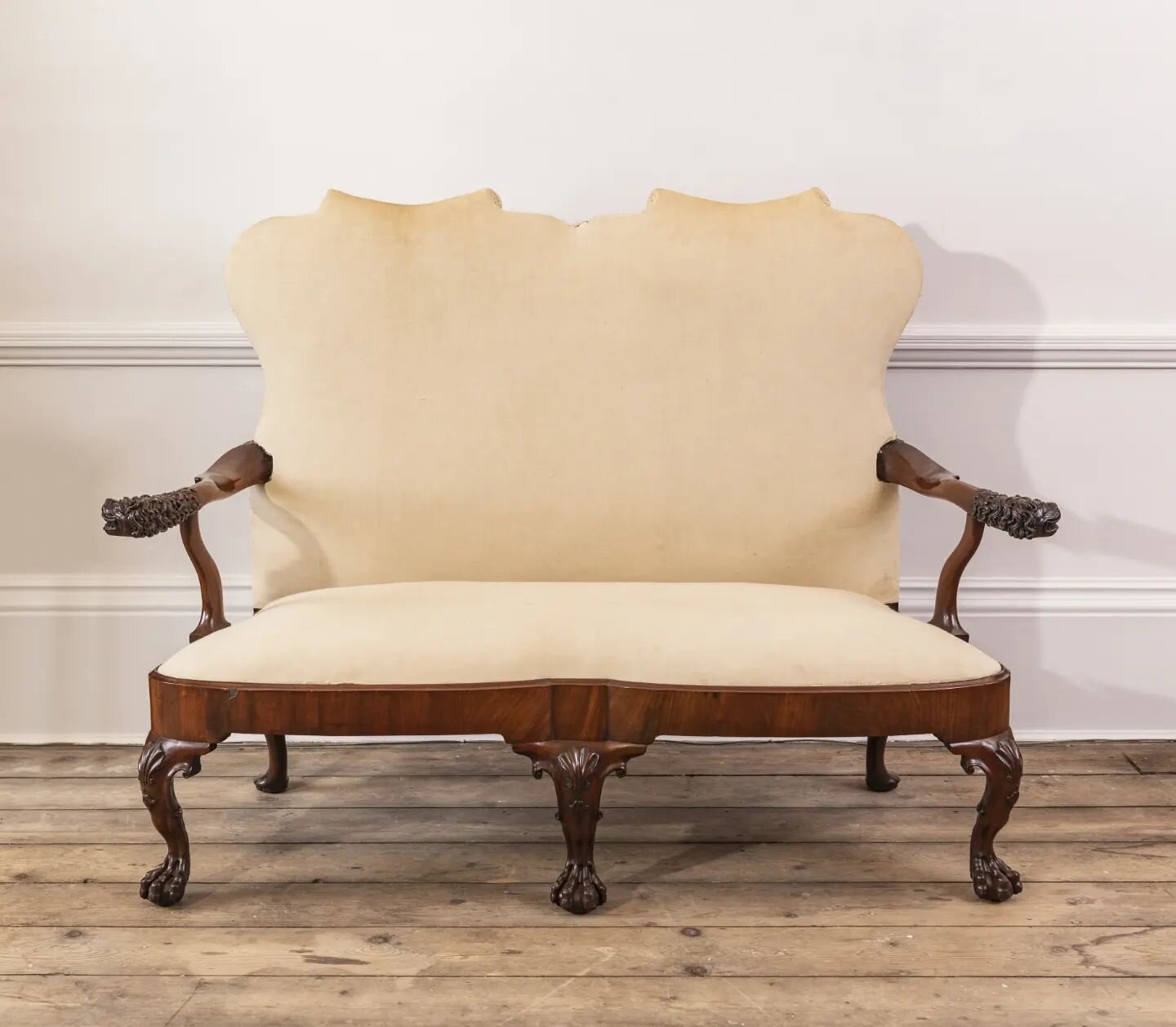 GEORGE II WALNUT SOFA

A mid 18th century walnut sofa with out-scrolled arms finished in sophisticated carved lions masks.

English, Circa, 1745

Note; Comparable carved lions masks can be seen on two chairs in the Gerstenfeld Collection

Price: &pou