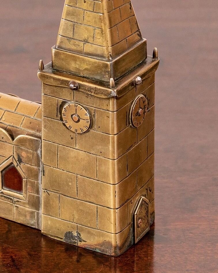 Perfect Christmas gift 🎁 

A RARE GEORGE III BRONZE MONEY BOX

English Circa 1790

A rare George III money box in the shape of a church tower.

Height 18cm
Width&nbsp; 25cm

&pound;950