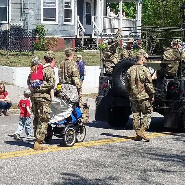 Happy memorial day everyone. I love this woman. She's a multitasking hero. She is piggybacking and pushing a stroller with a baby in it. She also was keeping close watch on the little boy next to her. I'm in awe of her. Thank you to all who have served and are currently serving our country. Today was also a celebration of my city's 150th birthday. I also got a picture of my grandfather's fire engine. :)