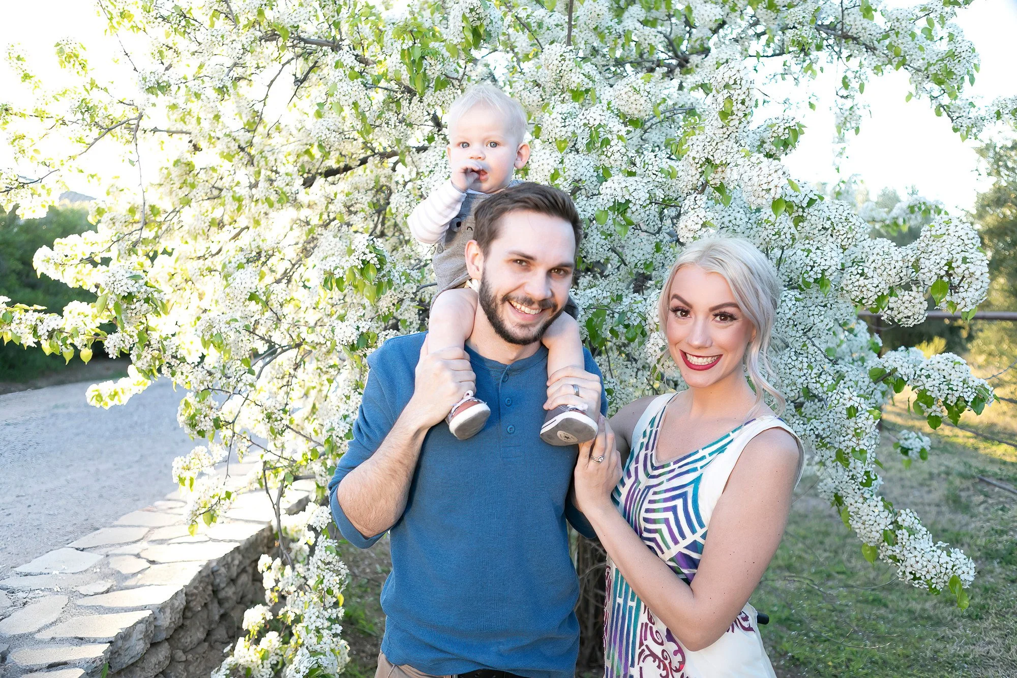 MOM AND DAD AND BABY APPLE BLOSSOMS FOUR SILOS FARM IN GILBERT ARIZONA .jpg