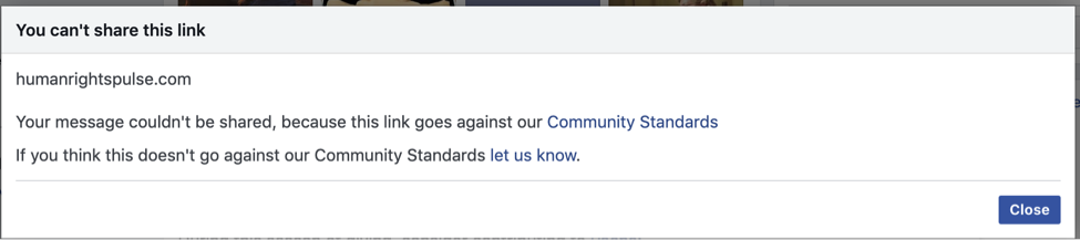 Another pop up indicating that the Human Rights Pulse domain name is banned on Facebook