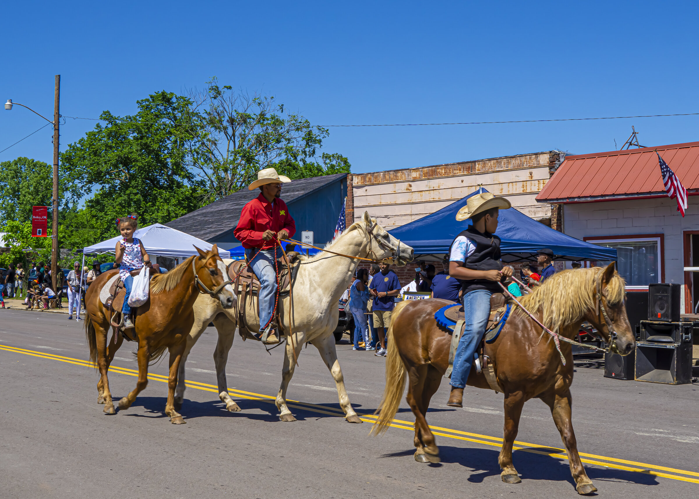 Dad and Kids in Boley Rodeo Parade