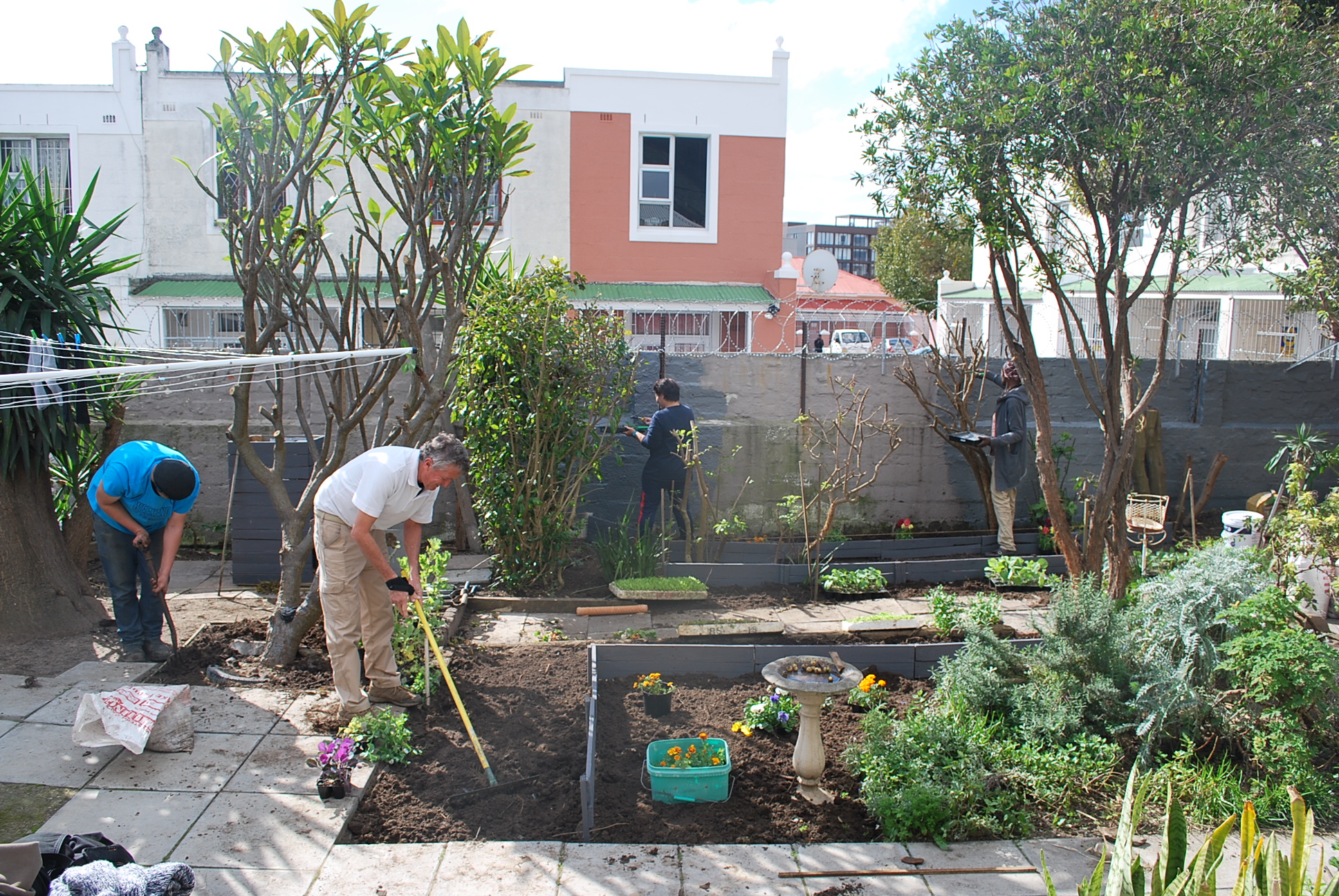 Turning the soil and adding mulch