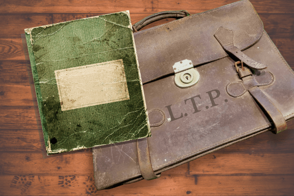 A scene from Kittie Lambton's 'The Cellist's Notebook' featuring Leni's notebook and satchel that Emily find in the attic of her grandmother's house.