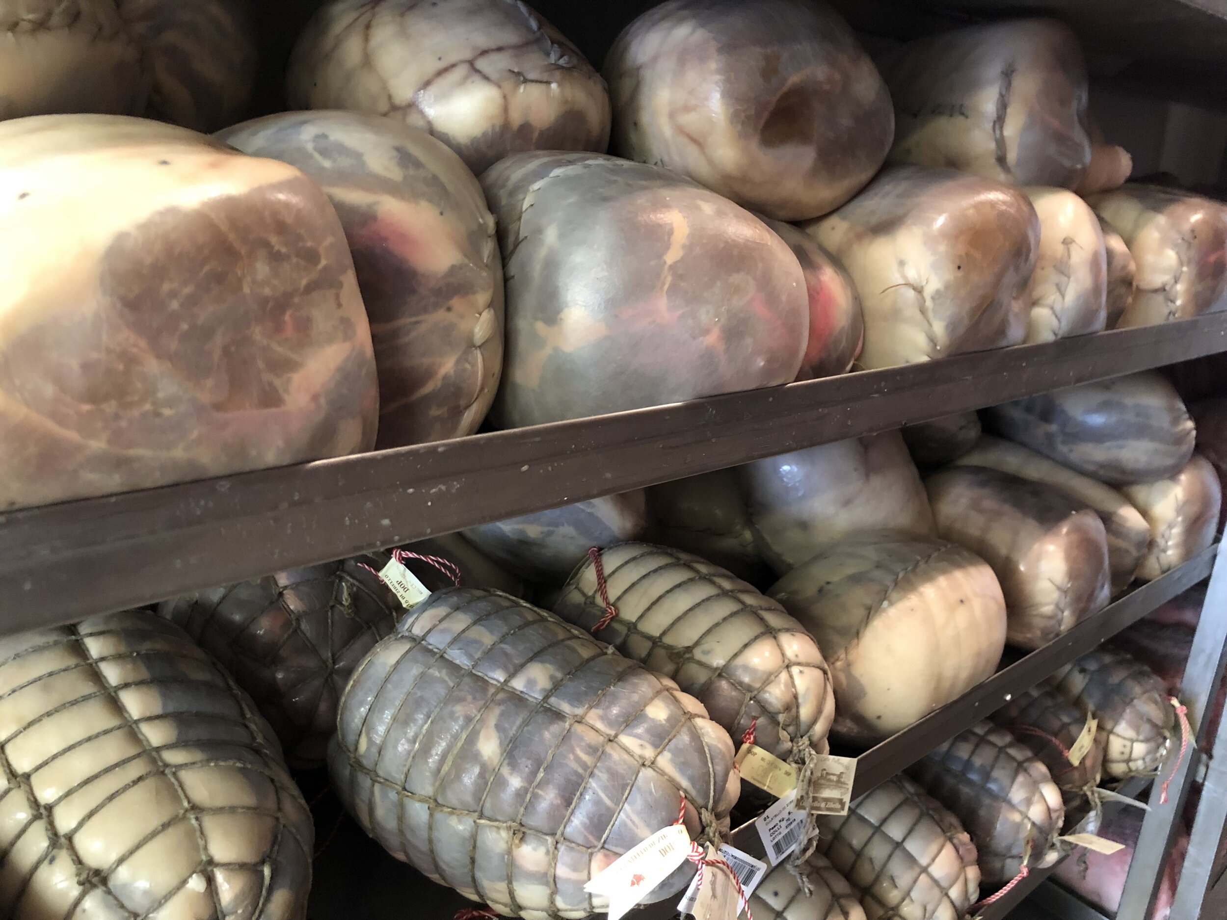 culatello inside the bladder (top) then wrapped in string (bottom)