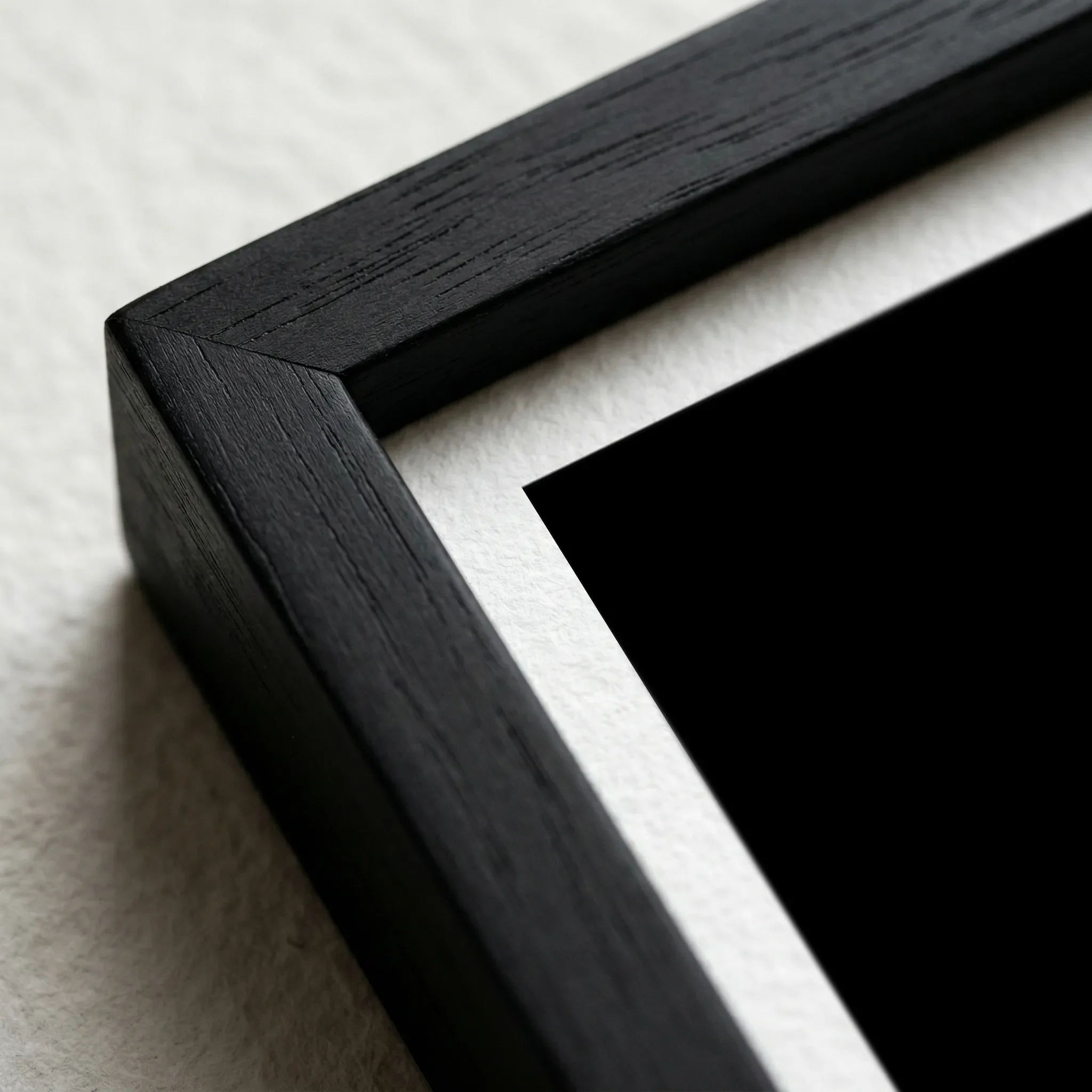 Cocoon Black Frame Micro Close up The 'Cocoon' abstract artwork in a black wooden frame, enhancing the deep shadows and the mysterious, atmospheric mood of the piece.
