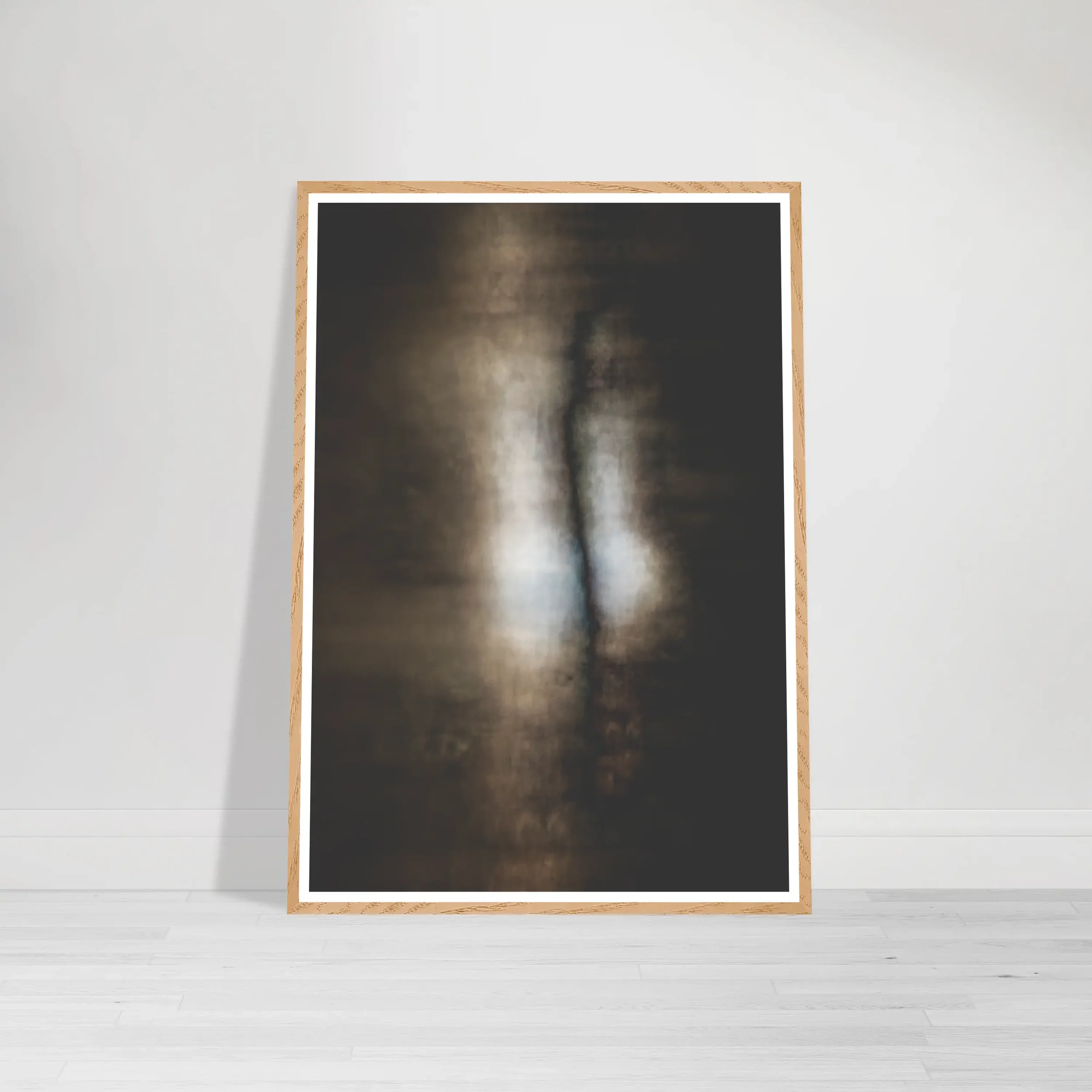 Abstract fine art print showing a soft blurred vertical form of light emerging from darkness, symbolising transformation and creation within the Cocoon series on wood frame