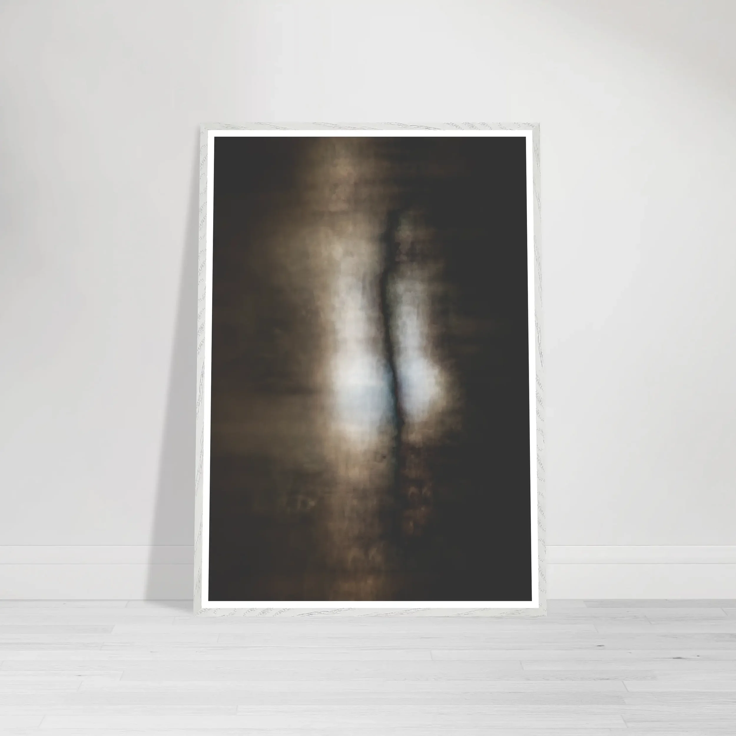 Abstract fine art print showing a soft blurred vertical form of light emerging from darkness, symbolising transformation and creation within the Cocoon series on white frame