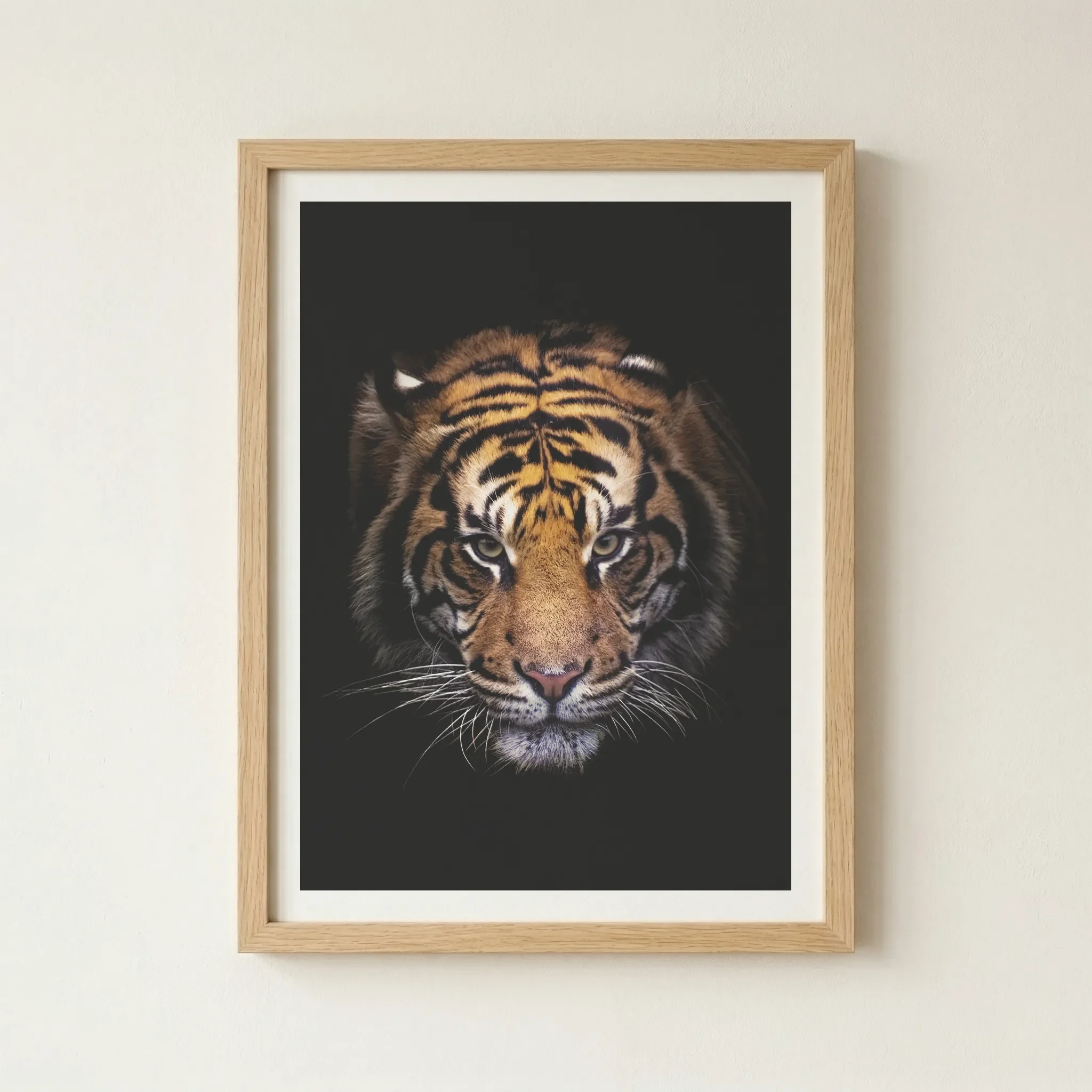 'Tiger' print in a natural wood frame, adding an earthy, organic warmth that reflects the tiger’s natural habitat and untamed spirit.