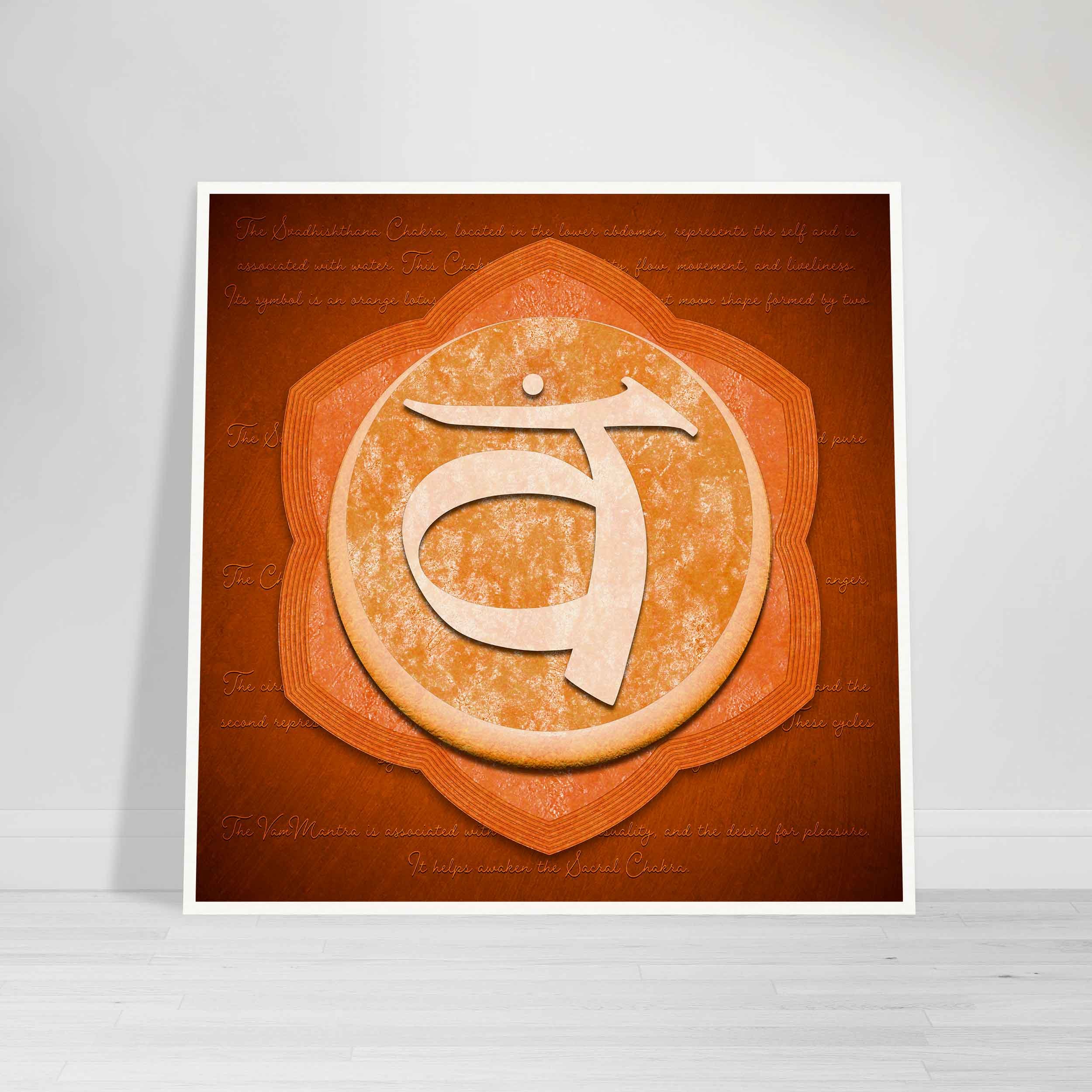 The Sacral Chakra in a orange background with a description of the charka print leading against a wall
