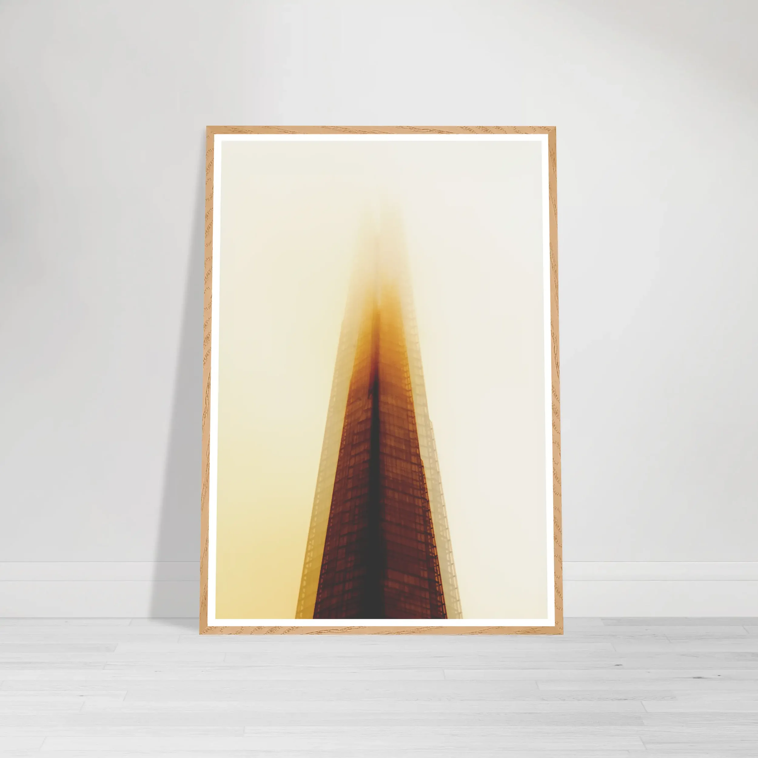 'The Tower of Light' in a natural wood frame, perfectly complementing the warm, organic amber tones of the sunrise-like atmosphere.