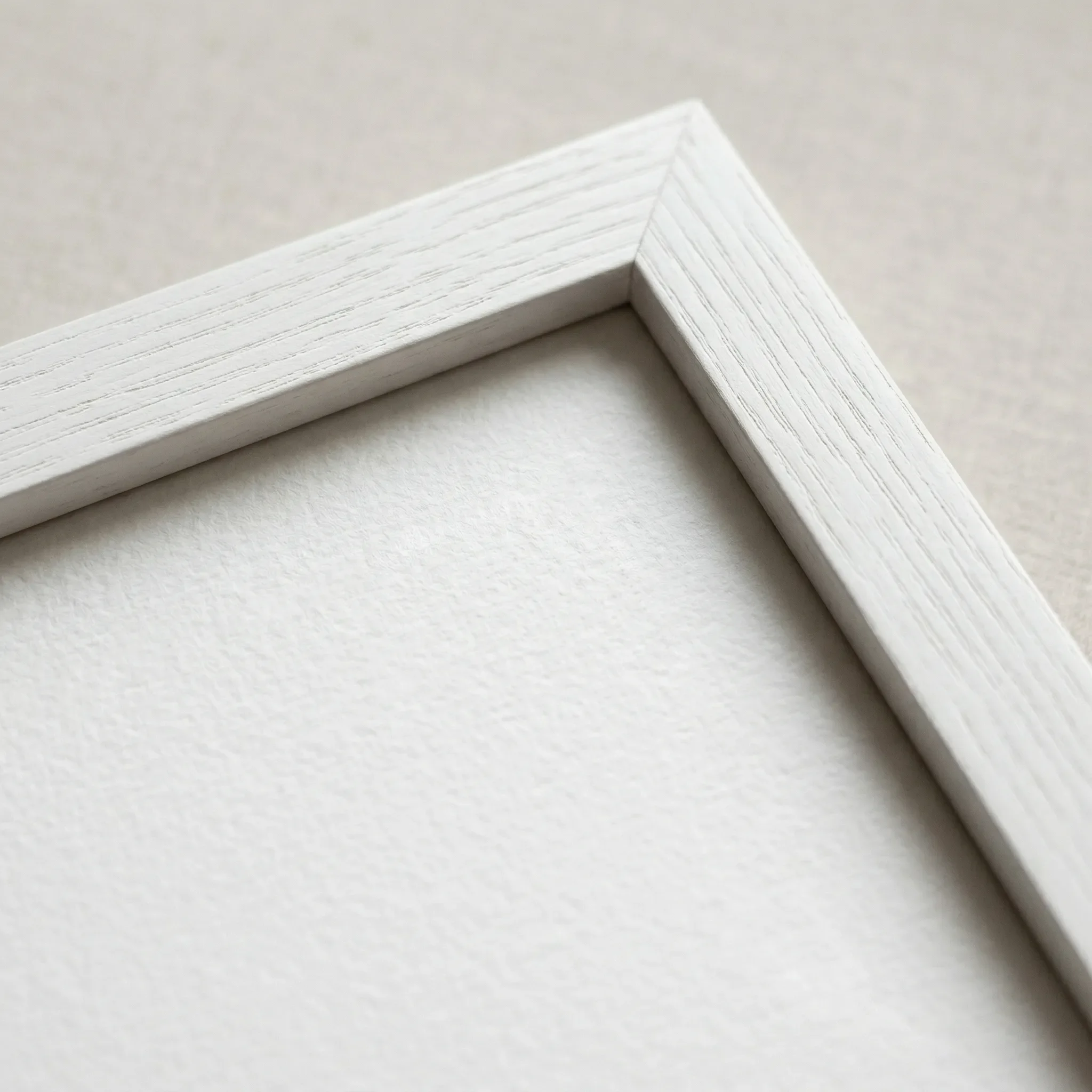 'The Orange Tree' fine art print in a Close up white frame for a seamless, minimalist aesthetic that emphasises the vibrant citrus hues and foliage.