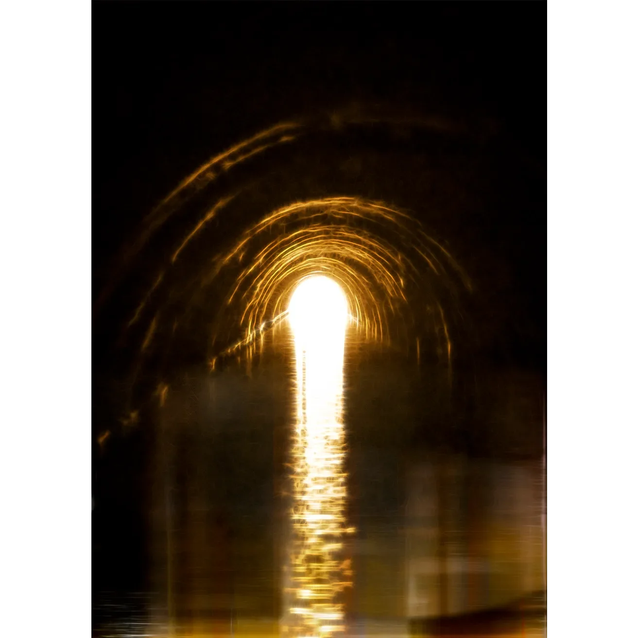 Abstract fine art print of the dark, concentric brickwork of London's Islington Tunnel leading to a bright beacon.