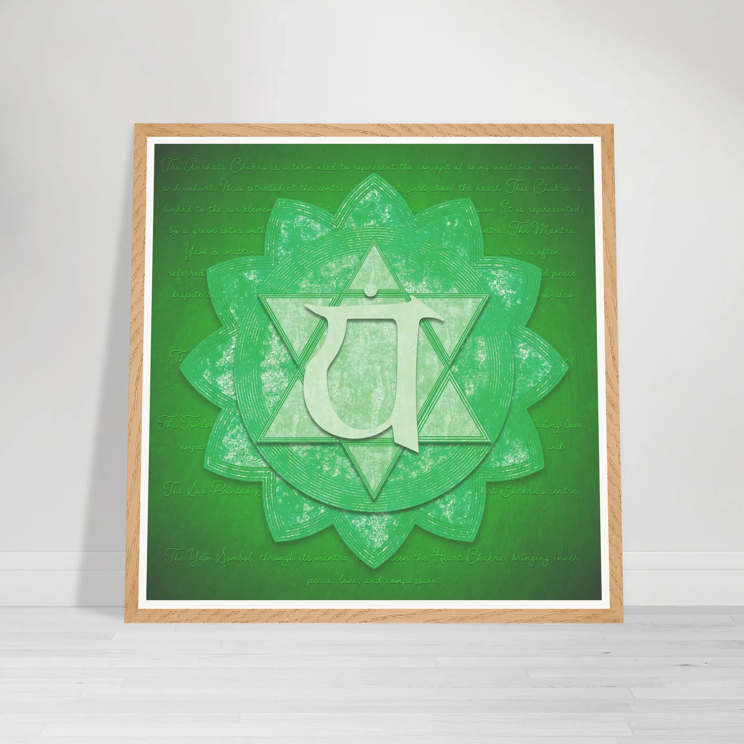 Green spiritual mandala fine art print of the Heart Chakra (Anahata), representing love and emotional healing, displayed in a wood frame.
