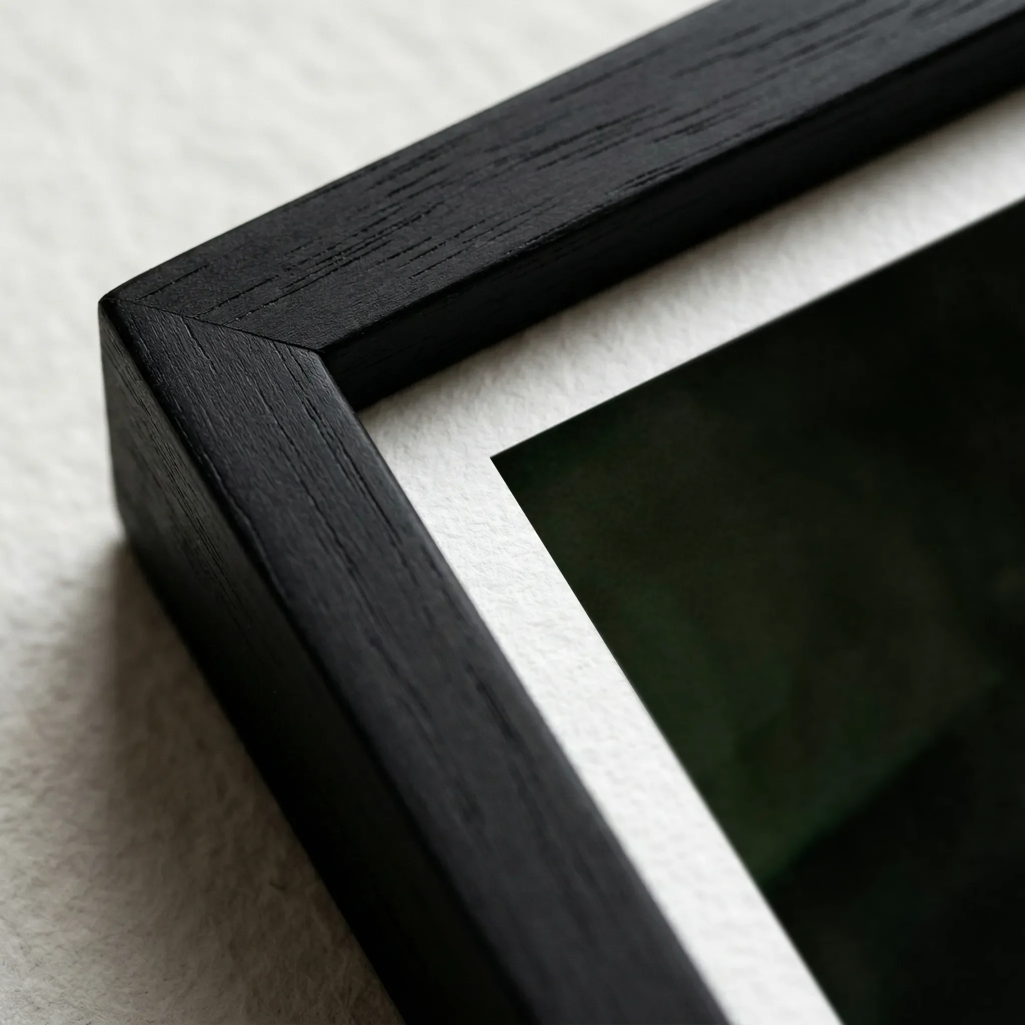 The 'Evolution' print in a close up black wooden frame, which grounds the deep, moody background and makes the golden "core of being" appear intensely luminous.