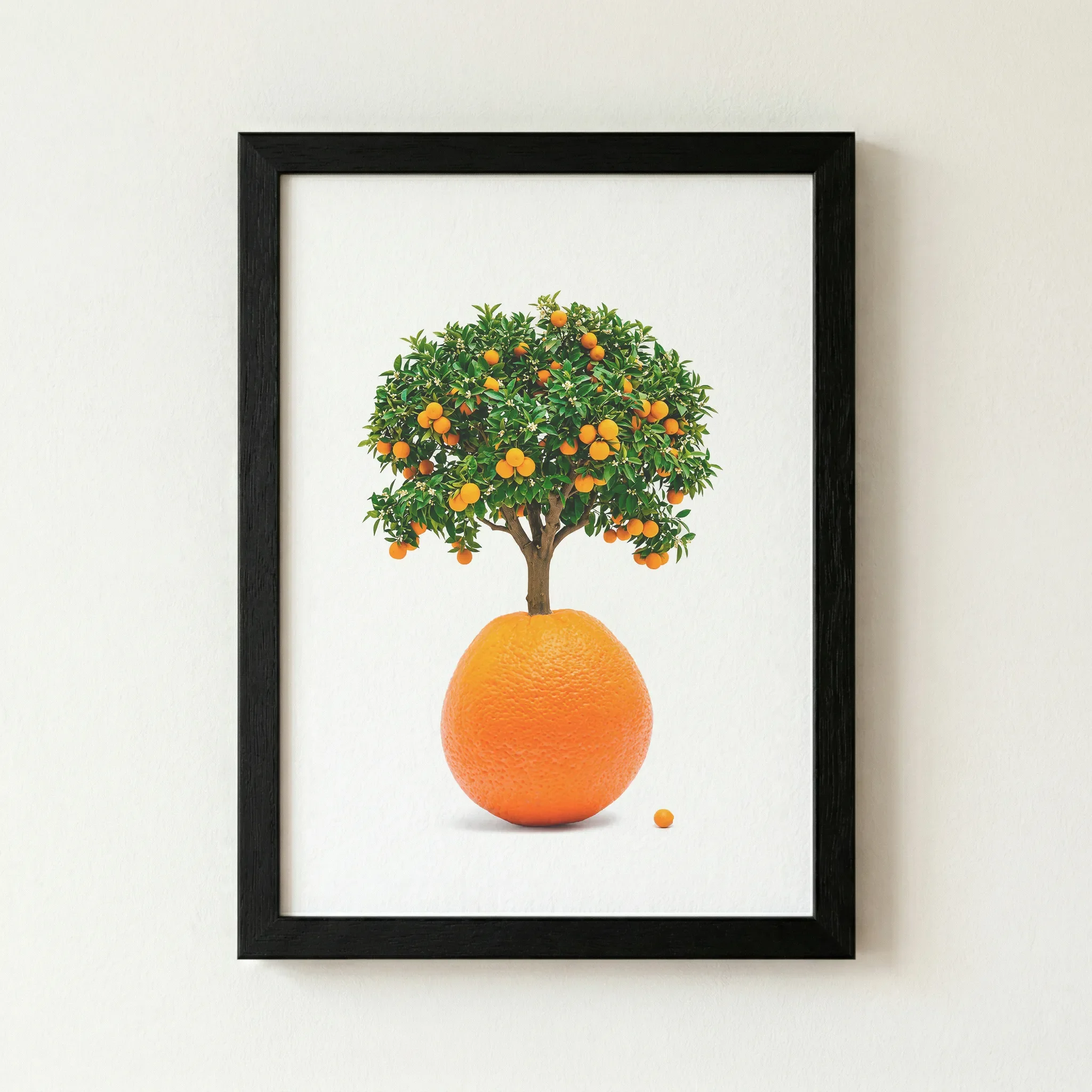 'The Orange Tree' print in a sleek black wooden frame, creating a modern, gallery-style contrast against the white negative space.