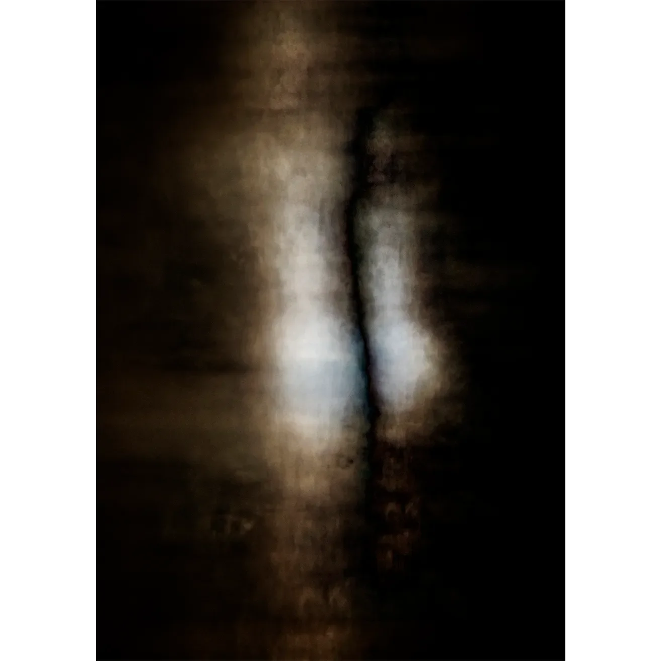 Abstract fine art print of two brilliant orbs of light emerging from a textured, sepia-toned void split by a vertical fissure.