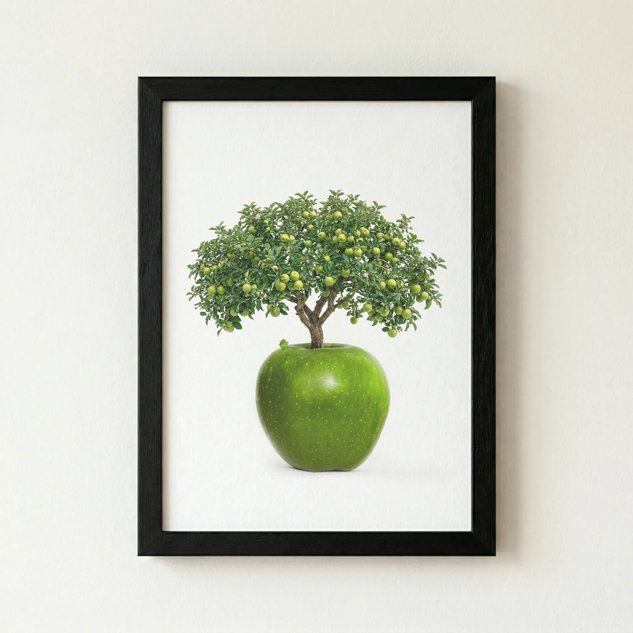 'The Apple Tree' print in a sleek black wooden frame, creating a modern, gallery-style contrast against the white negative space.