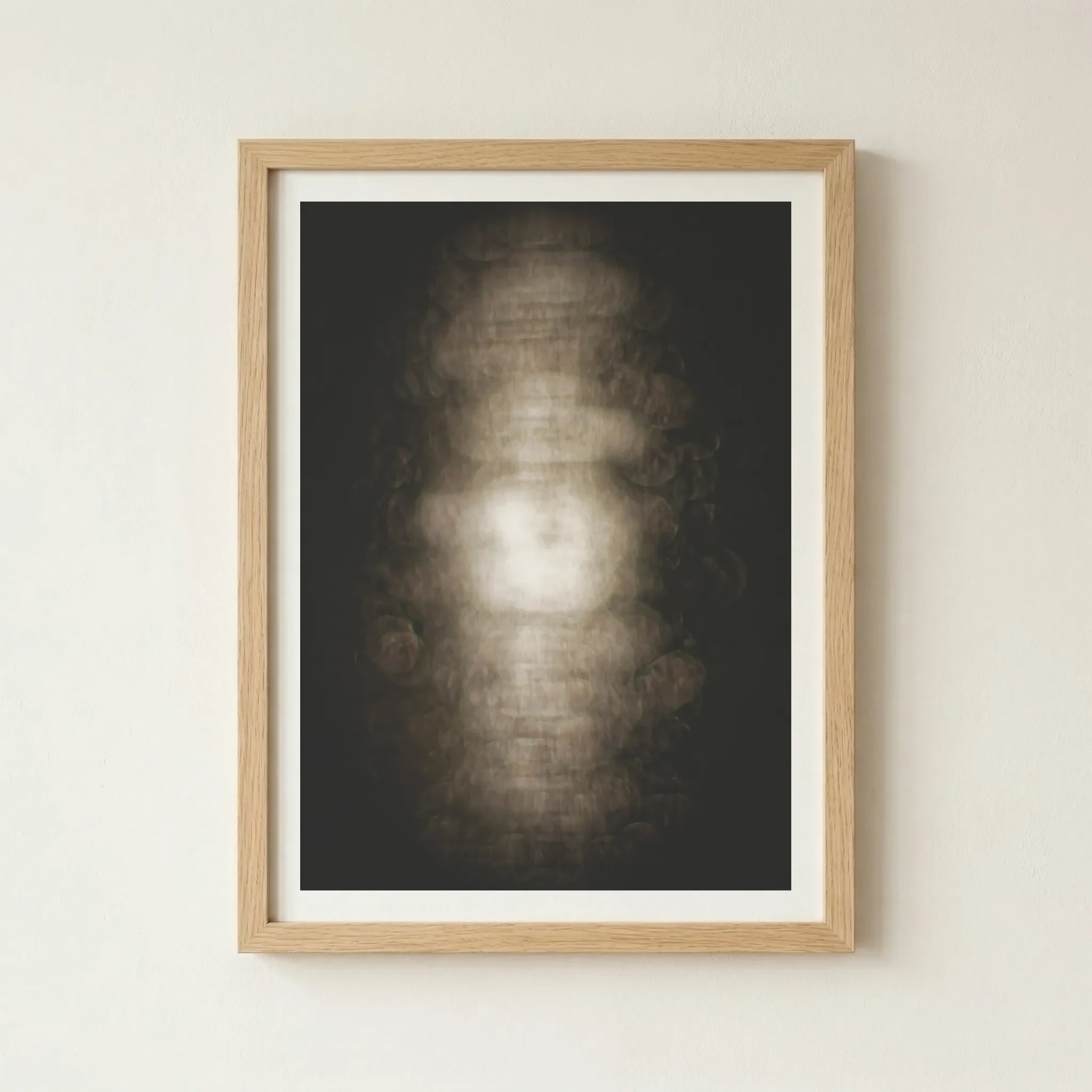 'Cocoon' fine art print in a natural wood frame, grounding the abstract, ethereal energy with an organic, earthy finish.