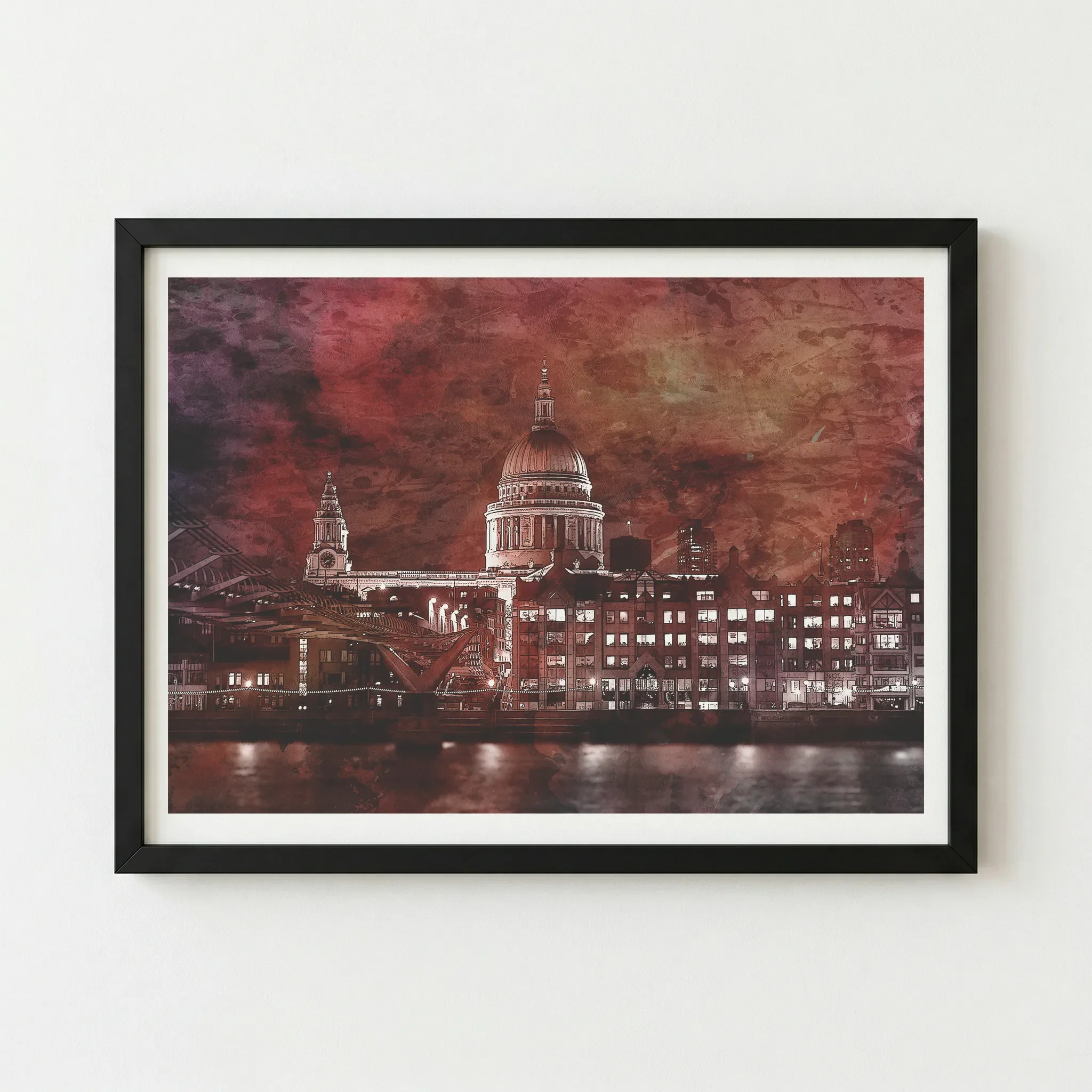 The St Paul’s remembrance print in a black wooden frame, which anchors the dark silhouettes and intensifies the radiant "heat" of the orange sky.