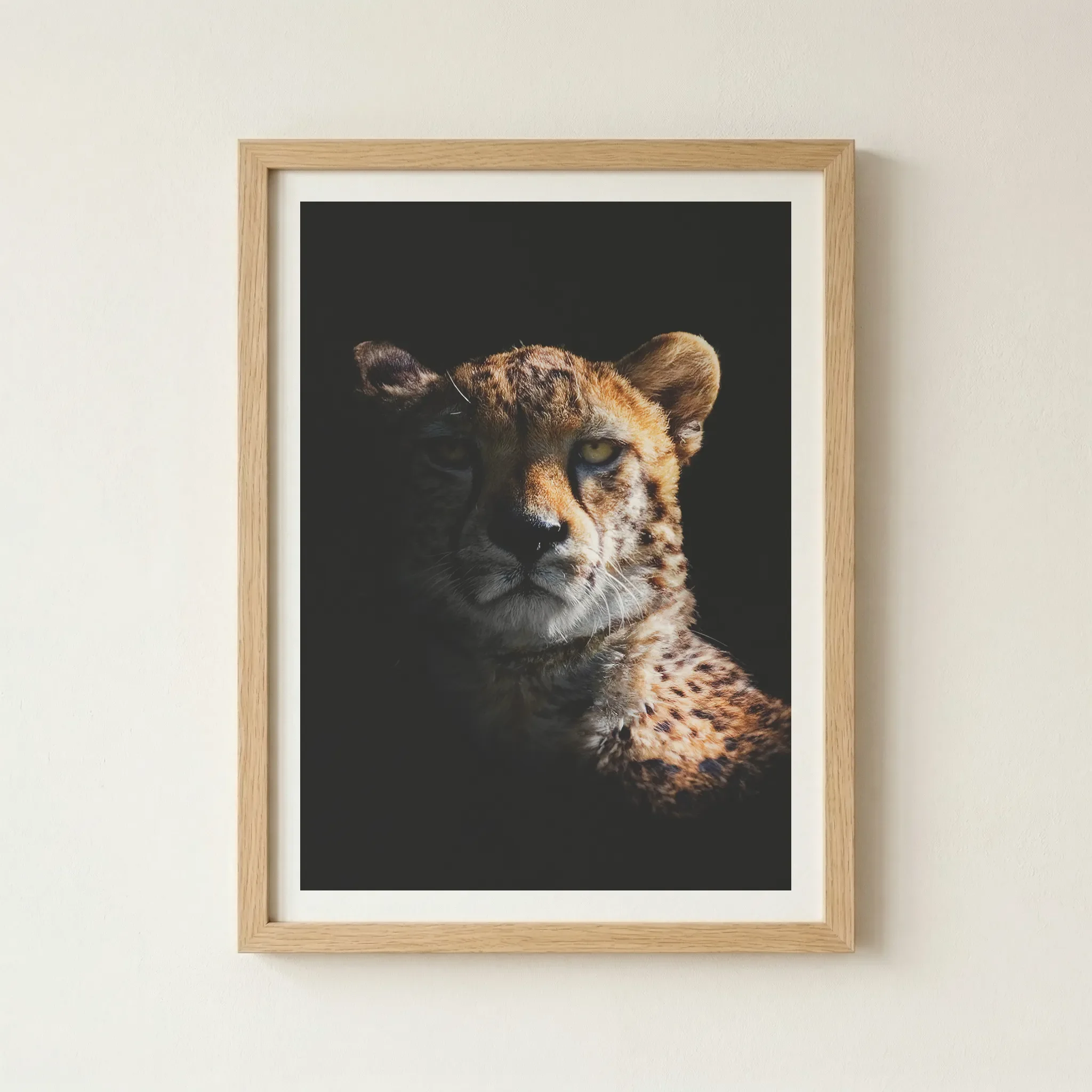 'Cheetah' print in a natural wood frame, adding an organic, grounded feel that perfectly complements the predator’s natural habitat.