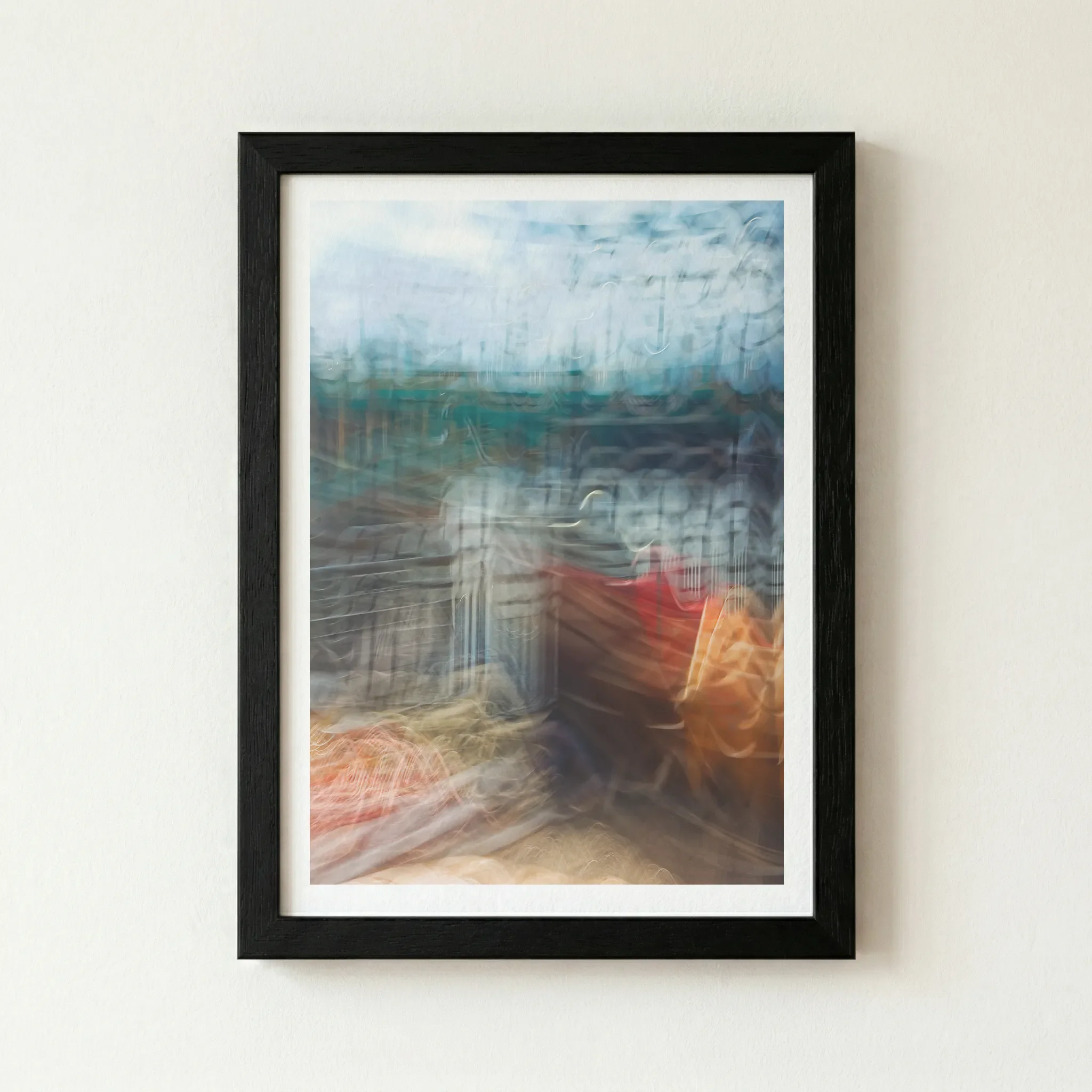 The 'Distorted Reality' abstract print in a black wooden frame, which grounds the chaotic energy and intensifies the deep, shadowy mid-tones.