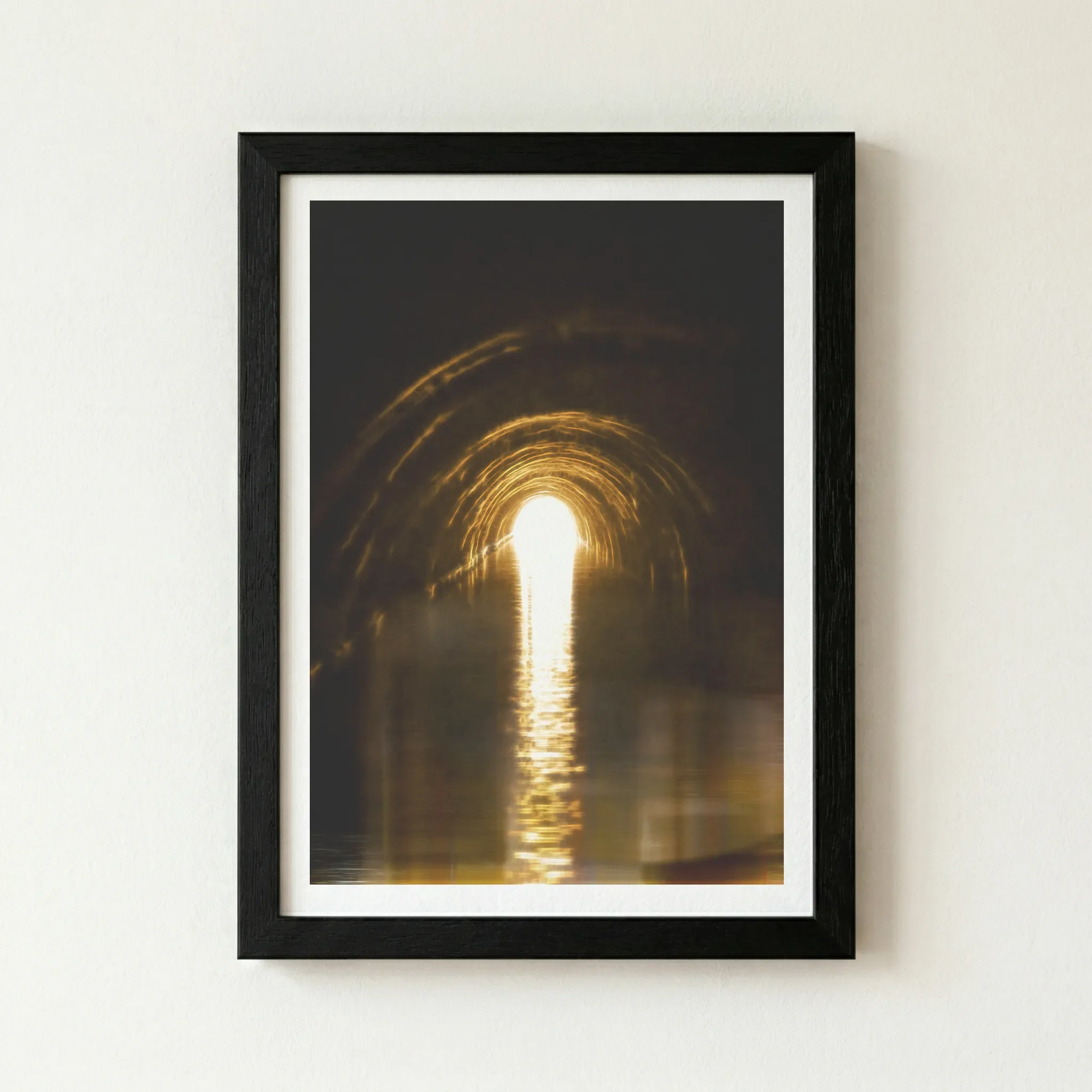 The 'Islington Tunnel' abstract print in a black wooden frame, which intensifies the subterranean shadows and draws the eye to the central light.