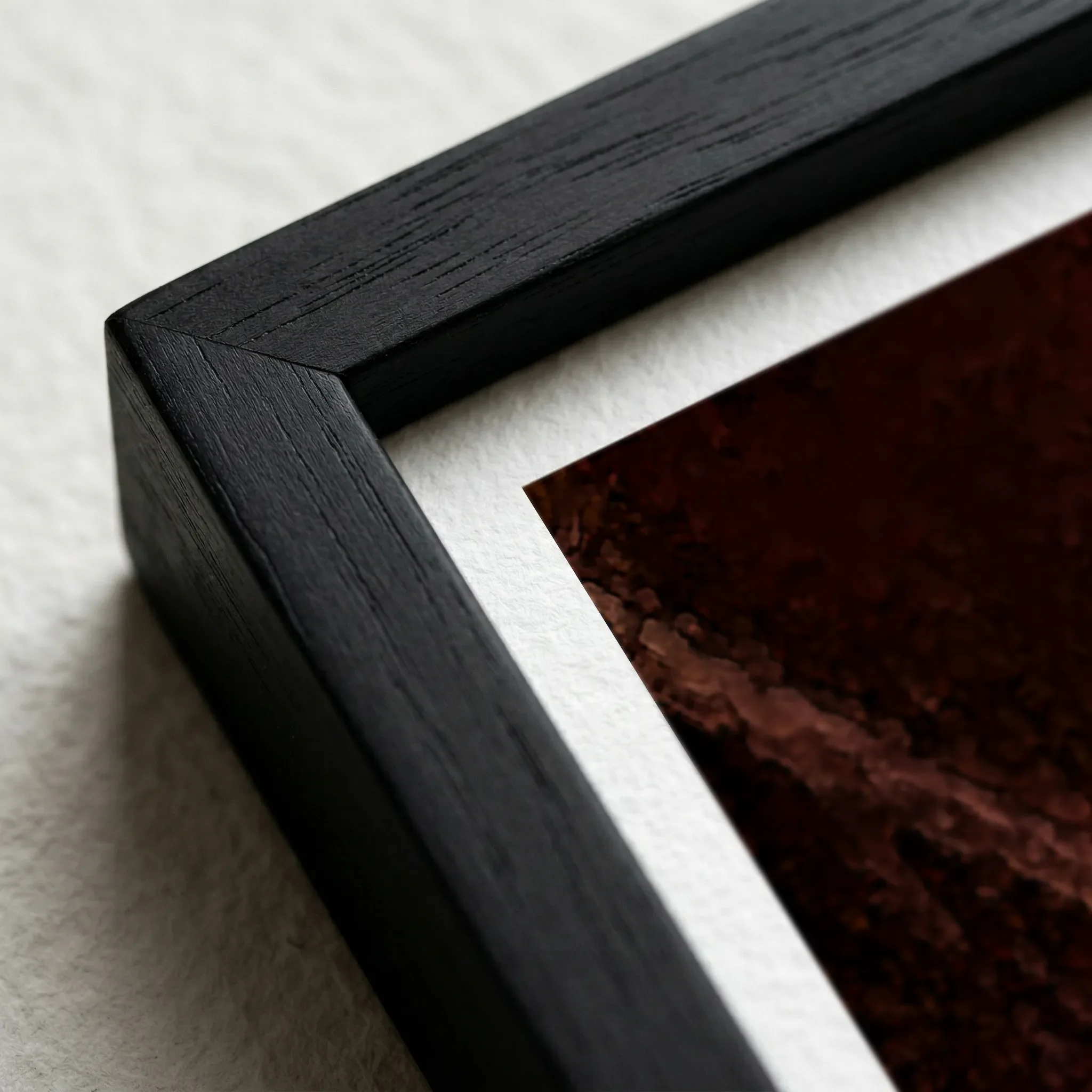 Dimension and Future Black Frame Micro Close up The 'Dimension and Future' ICM print in a black wooden frame, which grounds the deep crimson tones and enhances the cinematic feel of the motion.