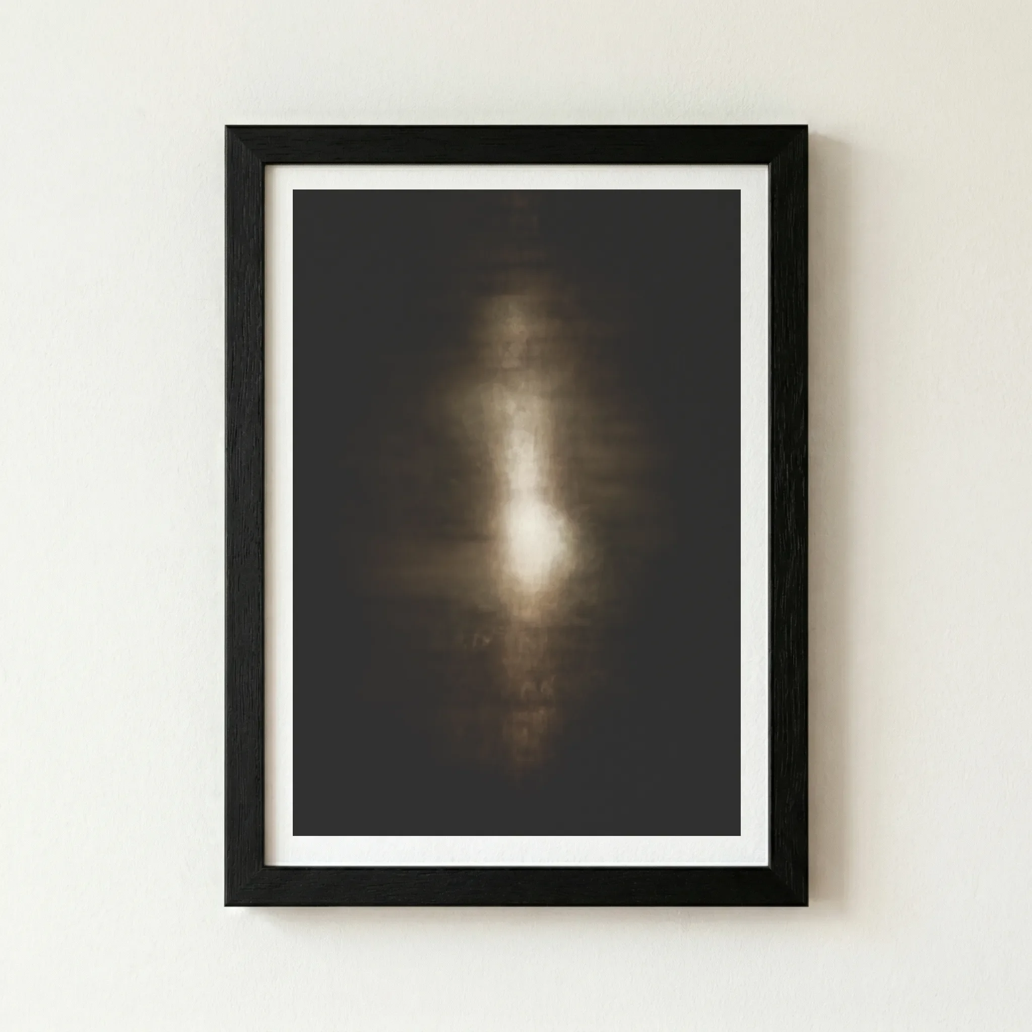 The 'Pulse' print in a black wooden frame, creating a seamless transition that makes the central light appear to vibrate against the dark border.