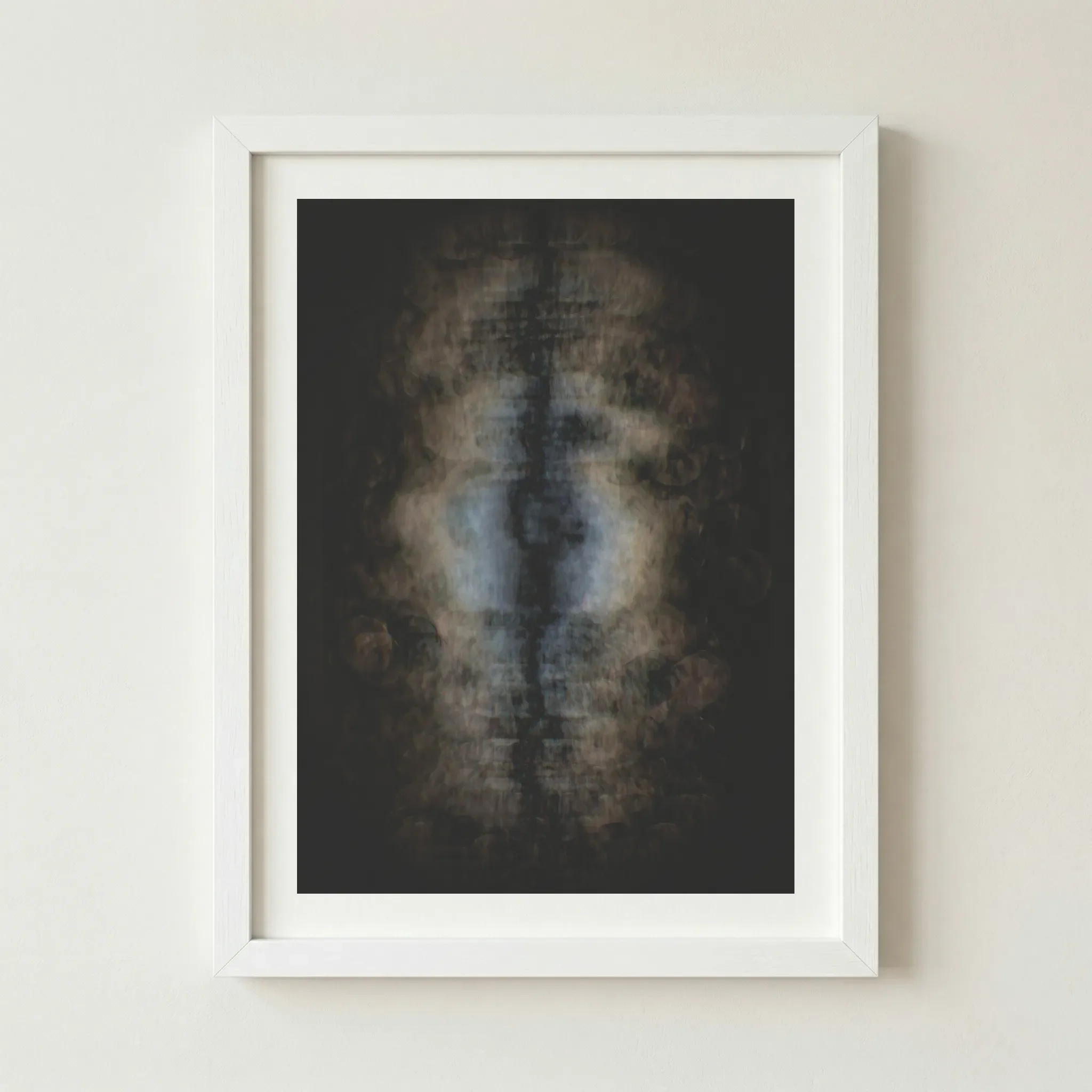 'Imaginal Cells' abstract print in a white frame, providing a clean contrast that highlights the ethereal, glowing blue and amber tones.