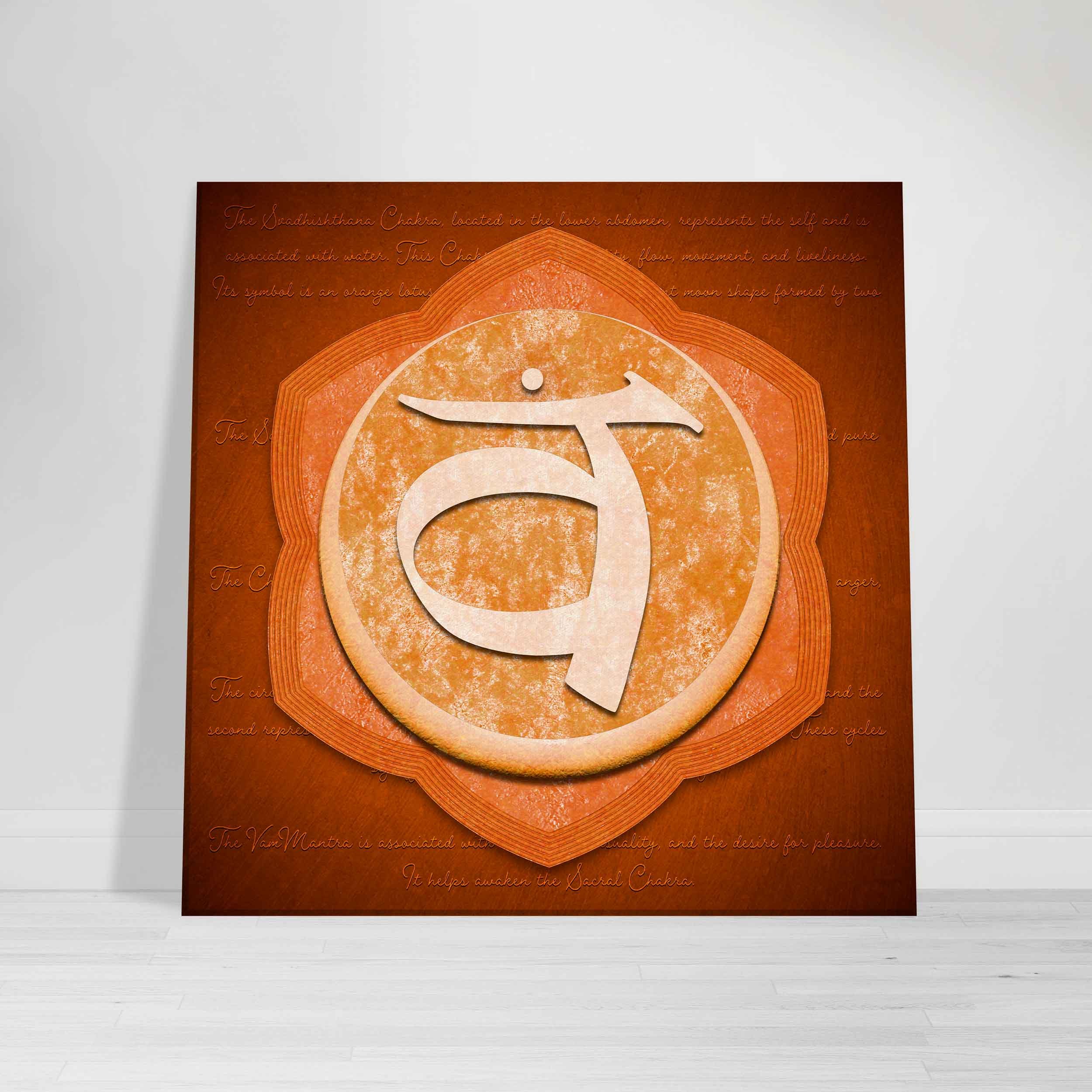 The Sacral Chakra in a orange background with a description of the charka canvas leading against a wall